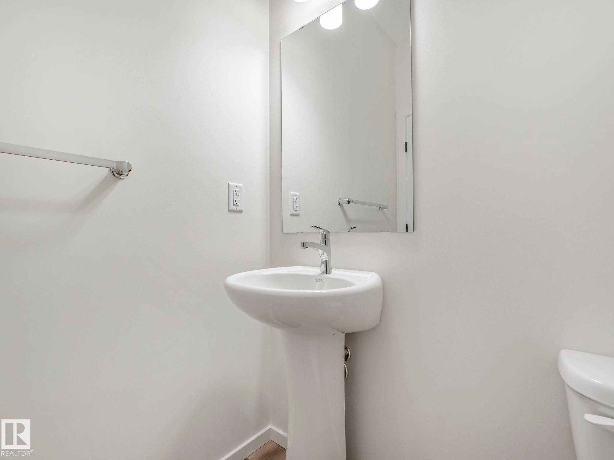 Half bath featuring toilet - 20506 16A Avenue, Edmonton, AB - Indoor Photo Showing Bathroom