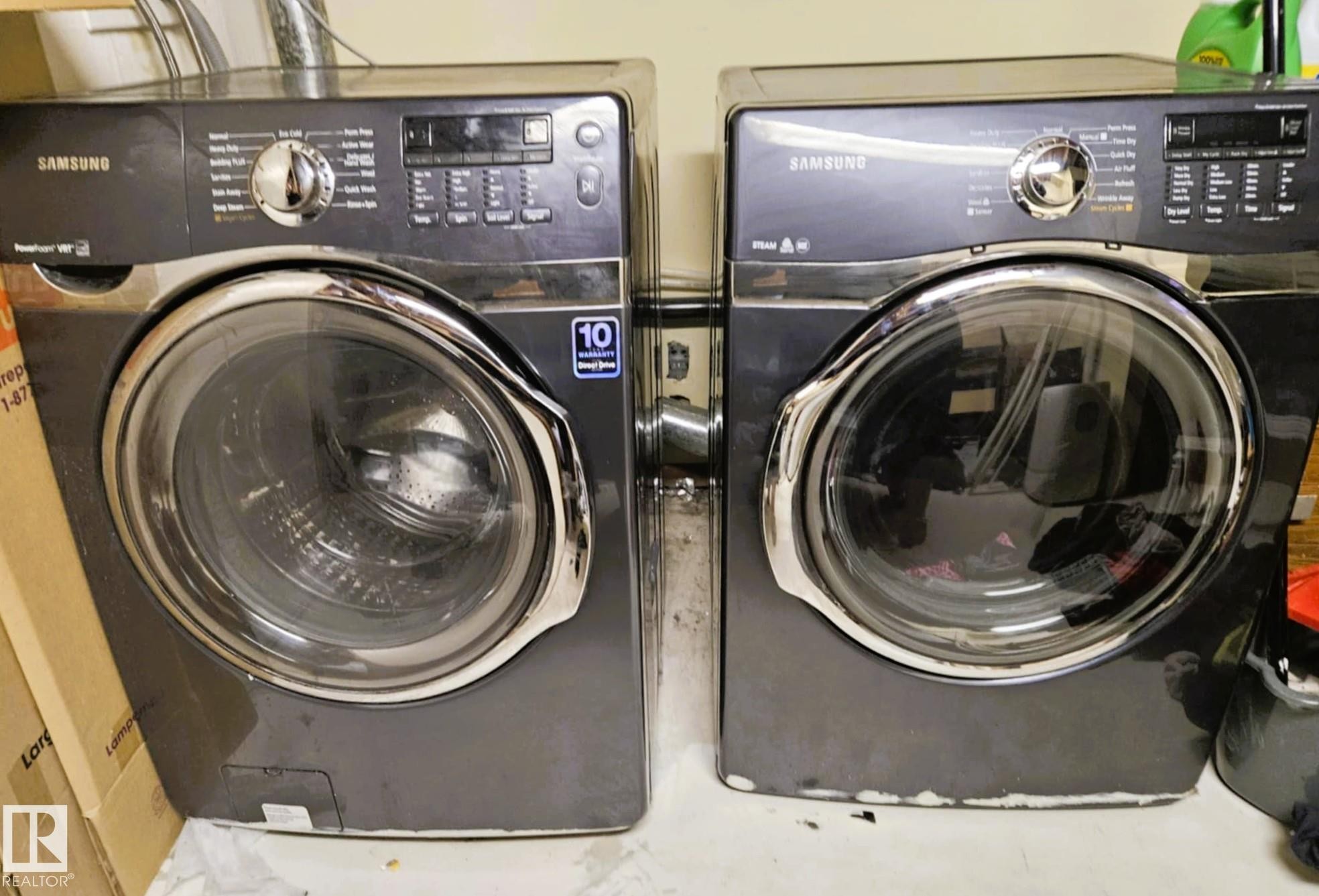 Laundry area with washing machine and dryer - 8512 131 Avenue, Edmonton, AB - Indoor Photo Showing Laundry Room