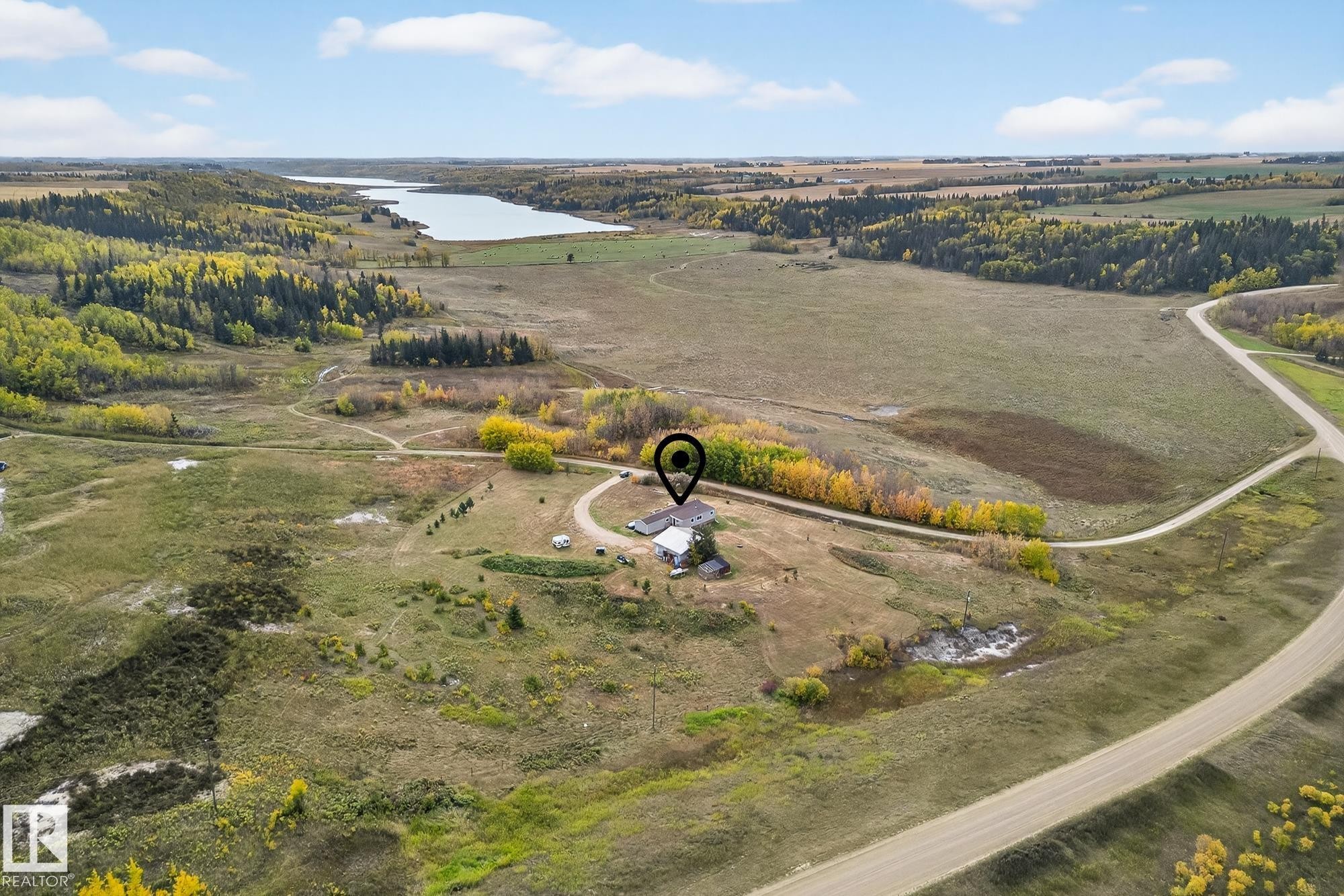 View of rural area featuring a nearby body of water - 23509A Twp Road 484, Rural Leduc County, AB - Outdoor With View