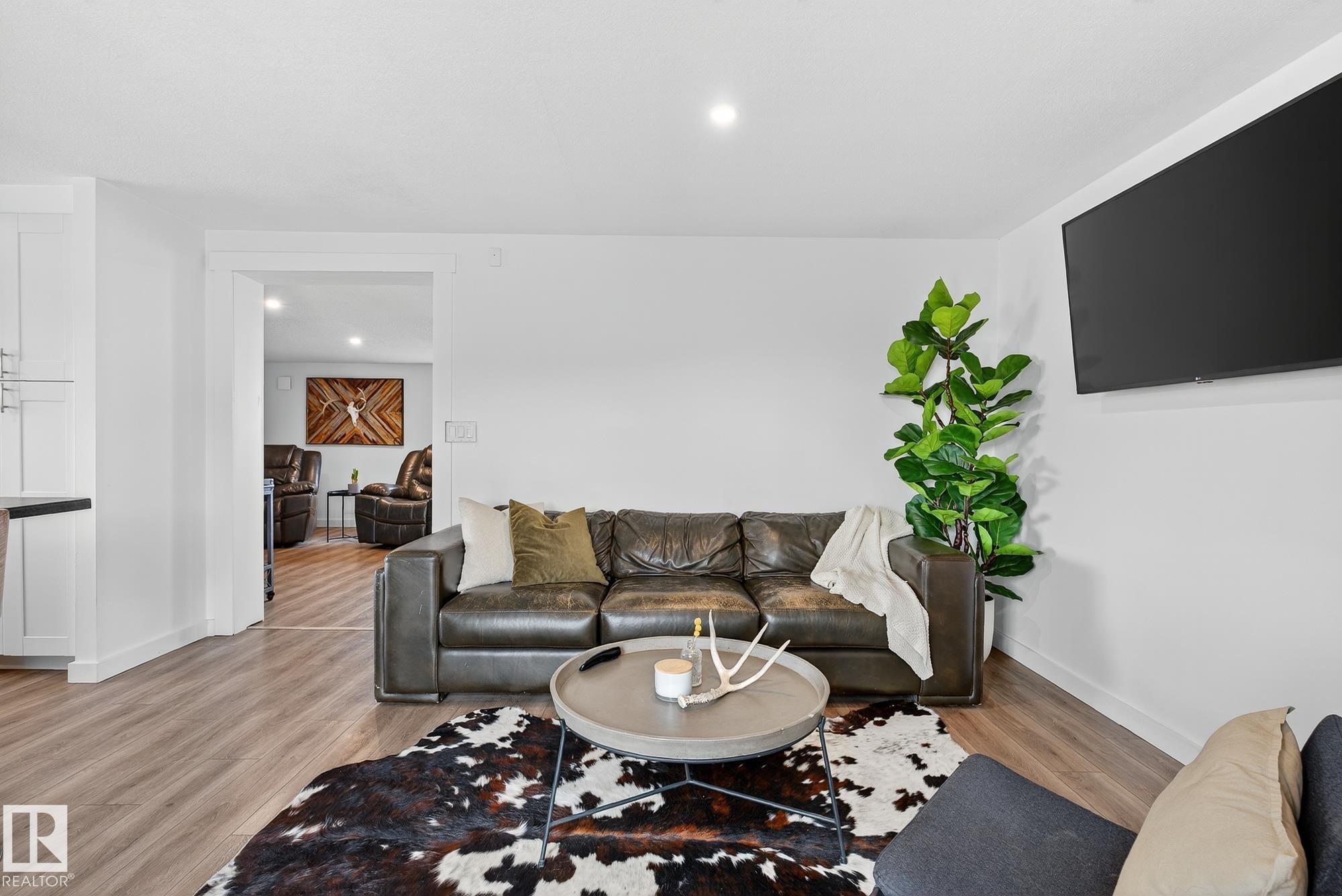Living room featuring recessed lighting and light wood-style flooring - 23509A Twp Road 484, Rural Leduc County, AB - Indoor Photo Showing Living Room