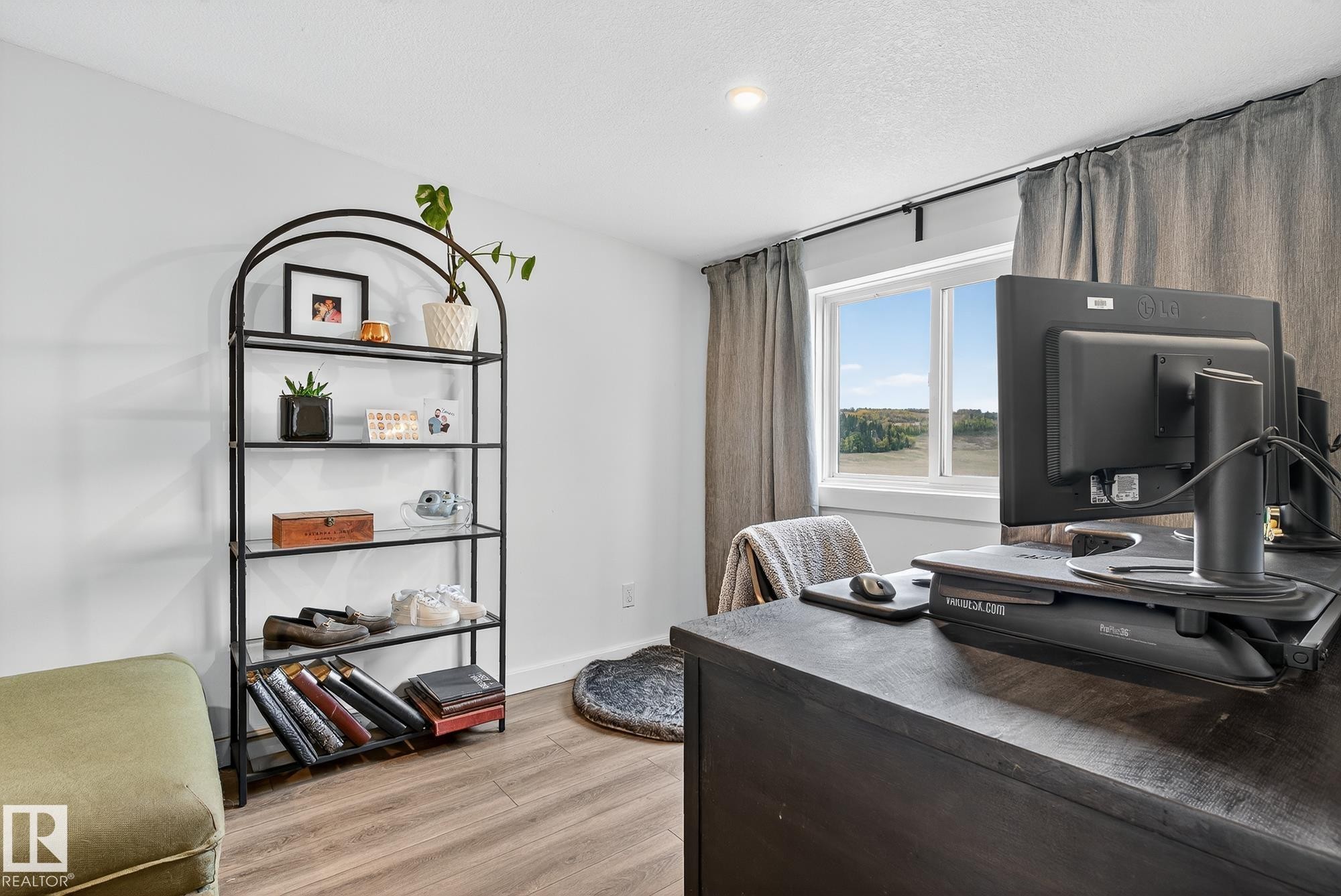 Office area with baseboards and light wood-style floors - 23509A Twp Road 484, Rural Leduc County, AB - Indoor Photo Showing Other Room