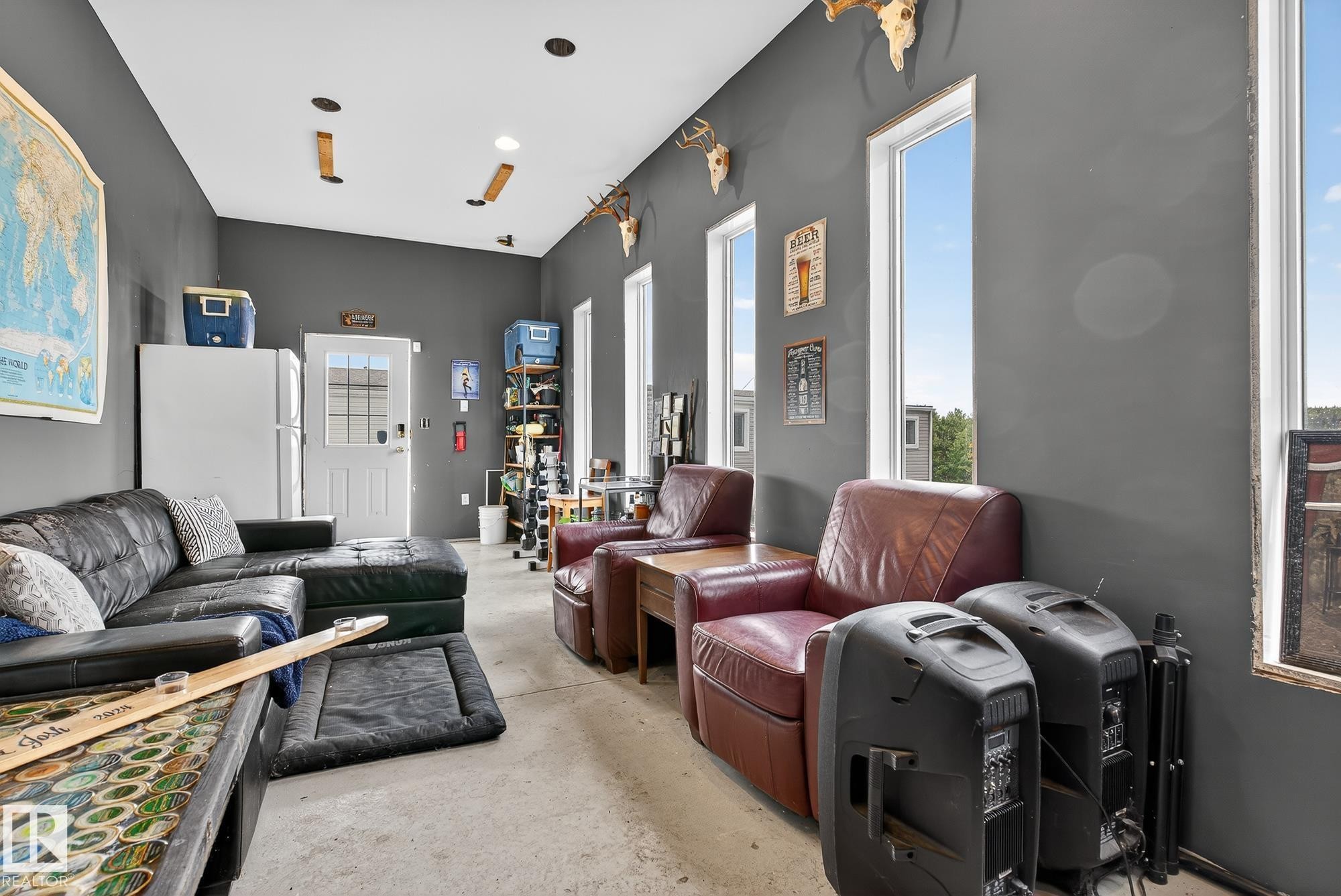 Living area featuring unfinished concrete flooring - 23509A Twp Road 484, Rural Leduc County, AB - Indoor