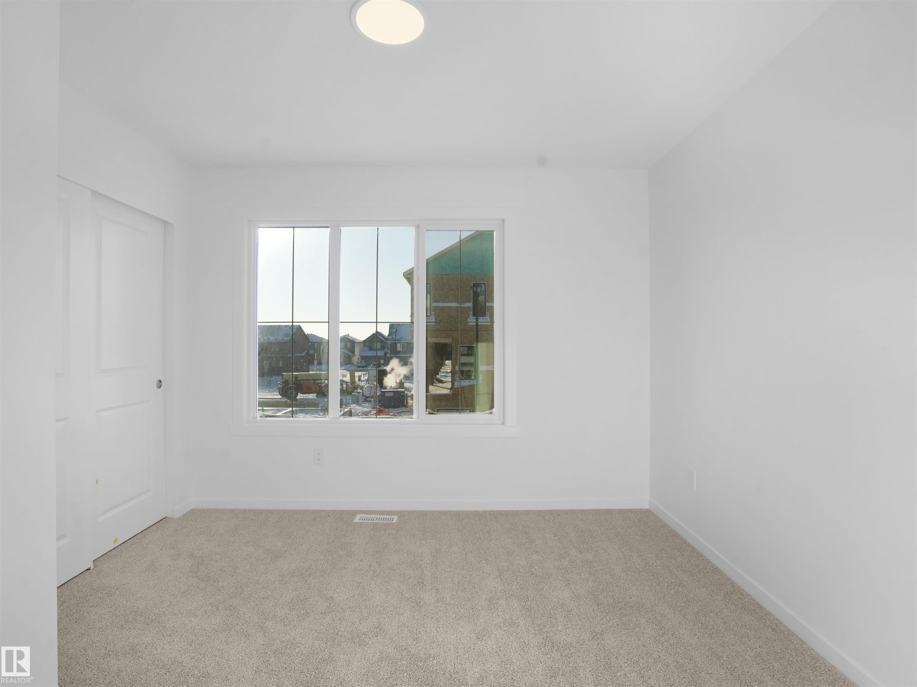 118 1009 Cy Becker Road, Edmonton, AB - Indoor Photo Showing Other Room