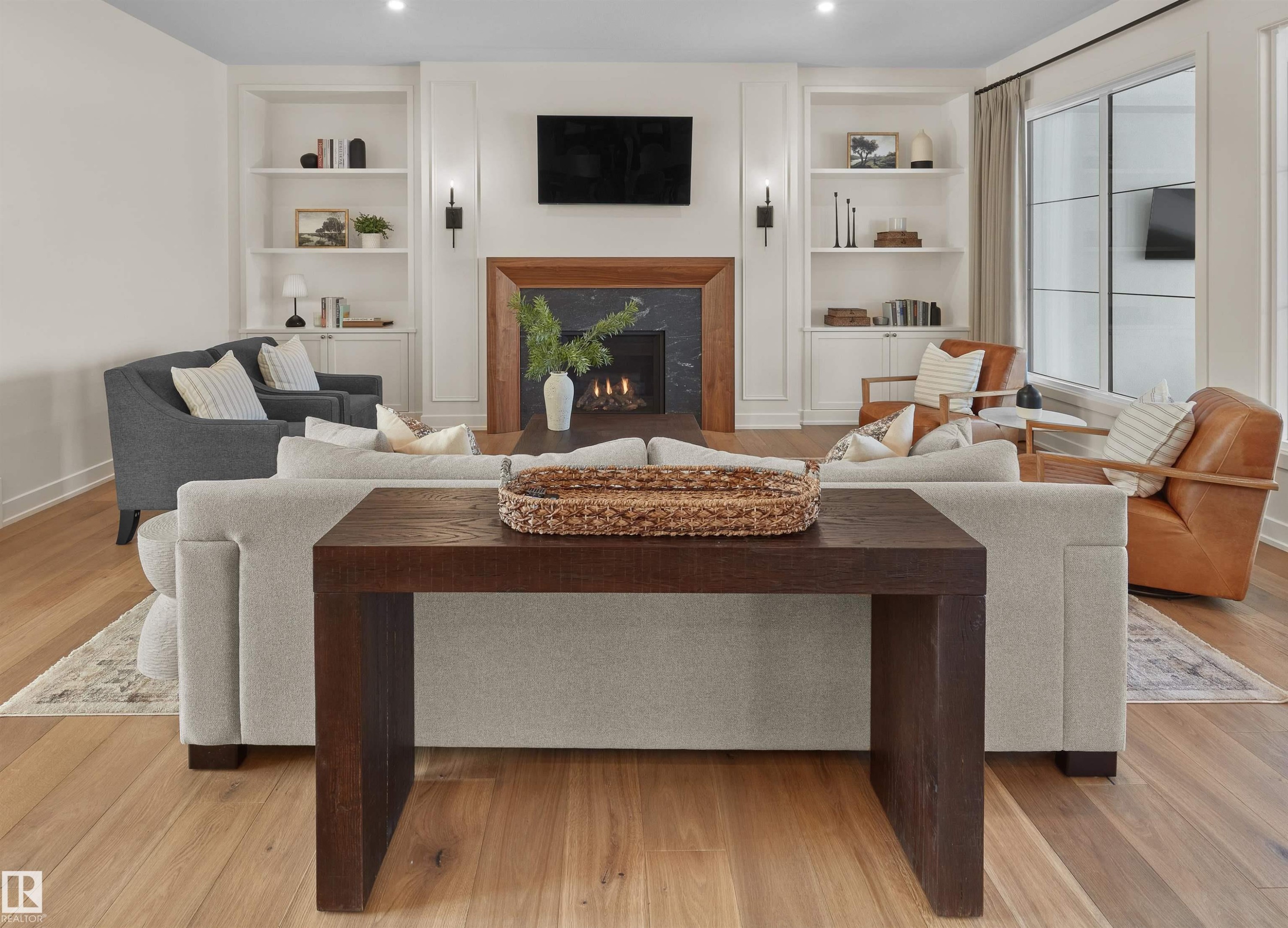 4183 Cameron Heights Point(E), Edmonton, AB - Indoor Photo Showing Living Room With Fireplace