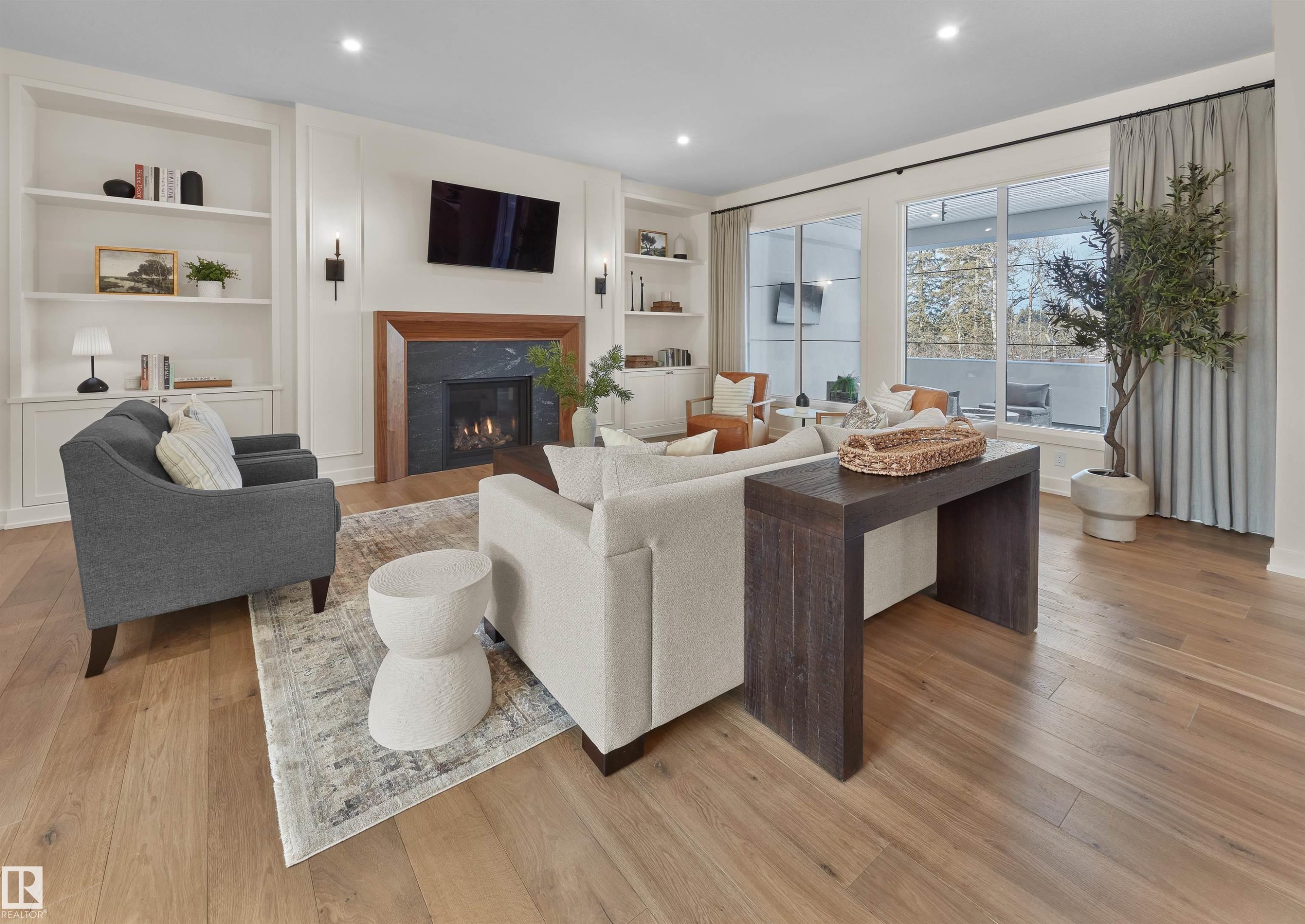 4183 Cameron Heights Point(E), Edmonton, AB - Indoor Photo Showing Living Room With Fireplace