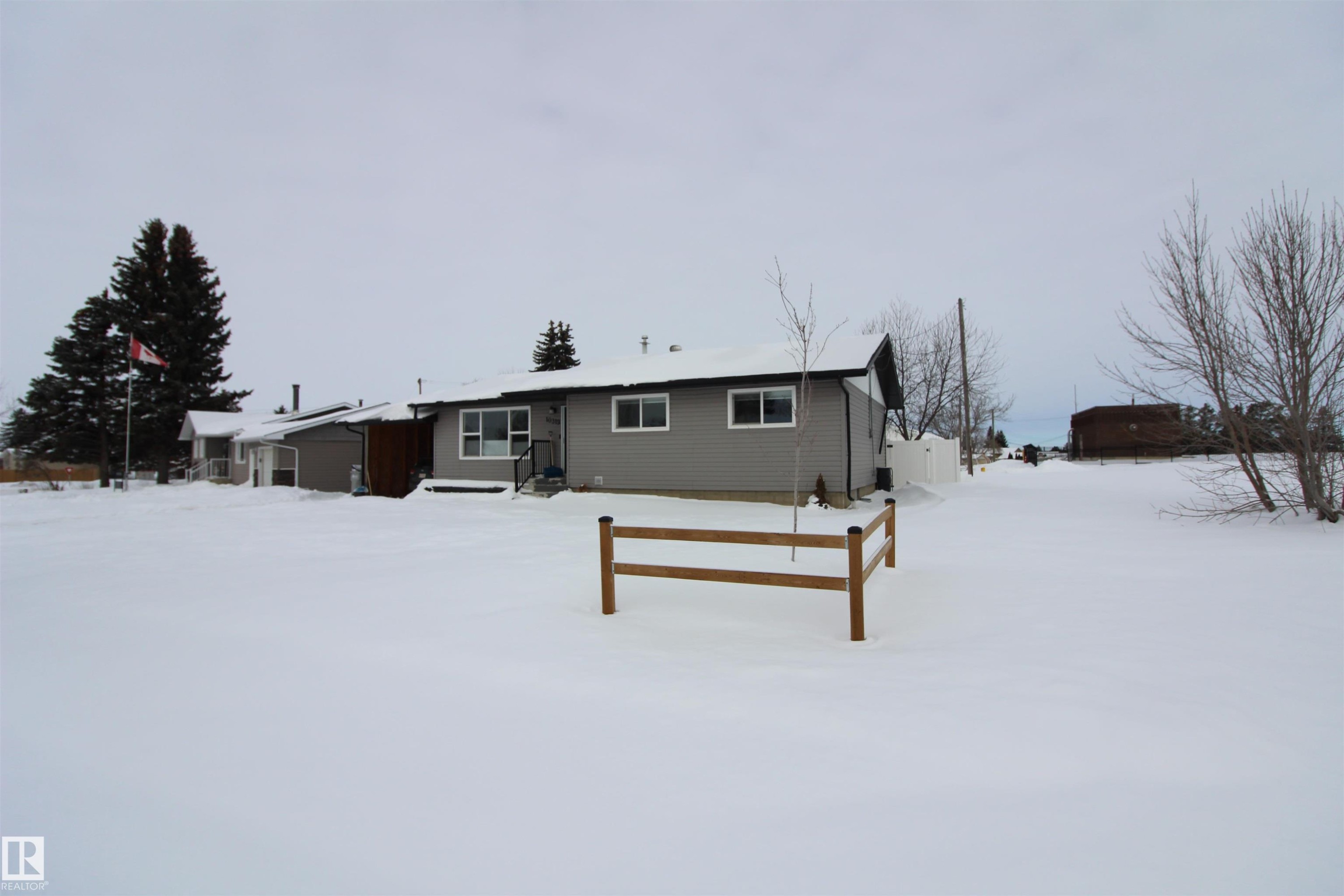 View of snow covered back of property - 10319 106 Ave, Westlock, AB - Outdoor