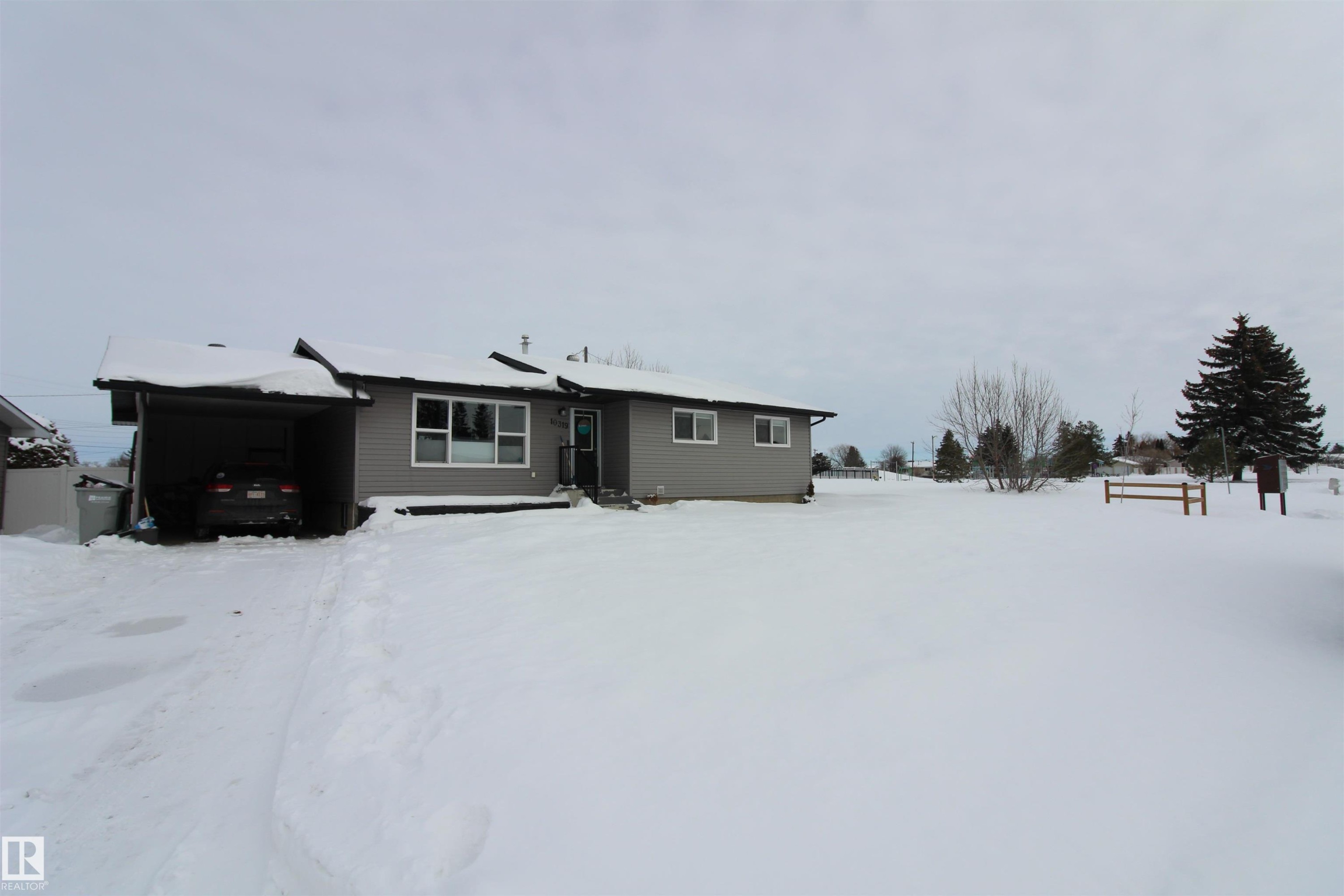 View of snow covered rear of property - 10319 106 Ave, Westlock, AB - Outdoor