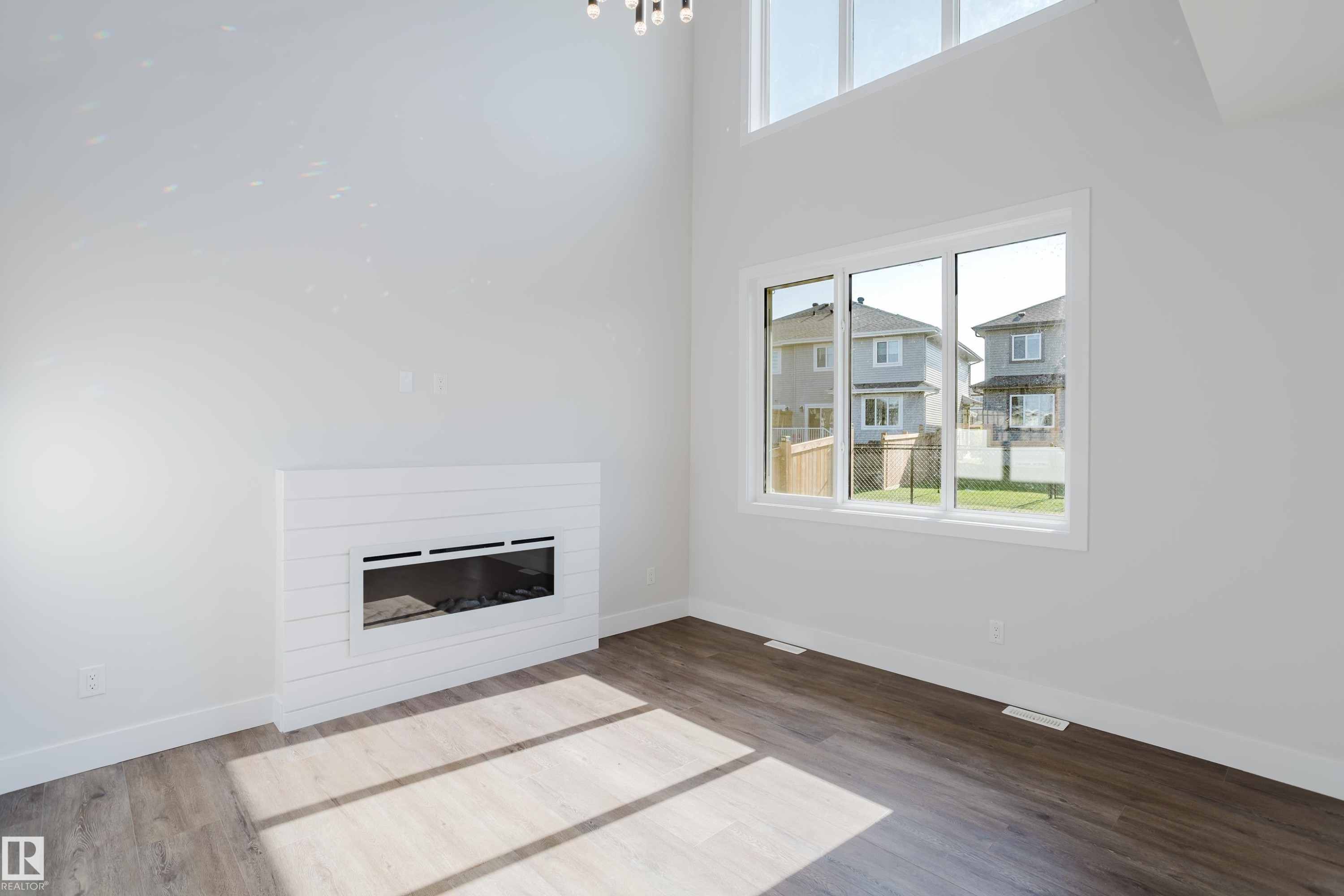 329 Balsam Link, Leduc, AB - Indoor Photo Showing Other Room With Fireplace