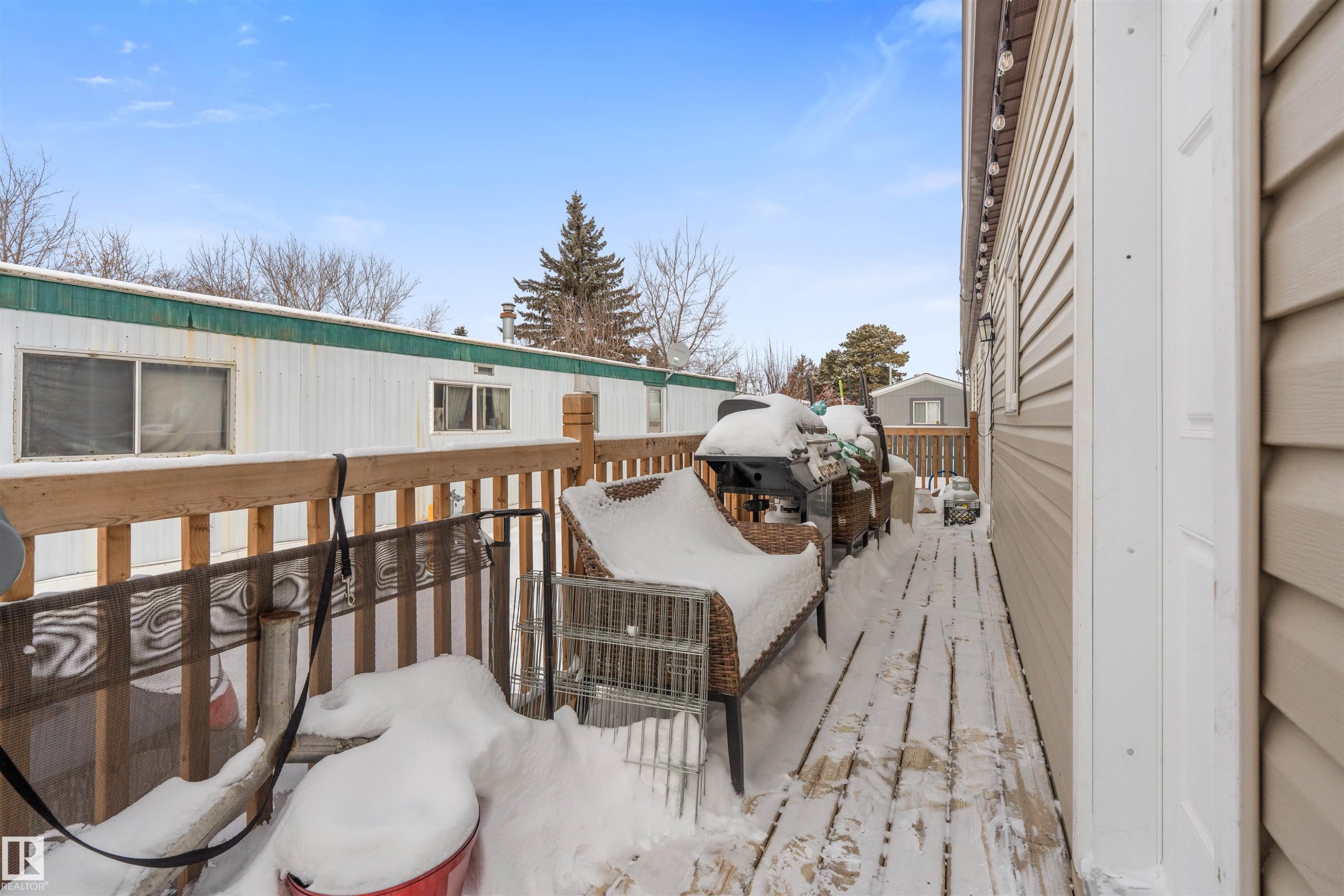 View of snow covered deck - 56 Westview Boulevard, Edmonton, AB - Outdoor With Deck Patio Veranda With Exterior
