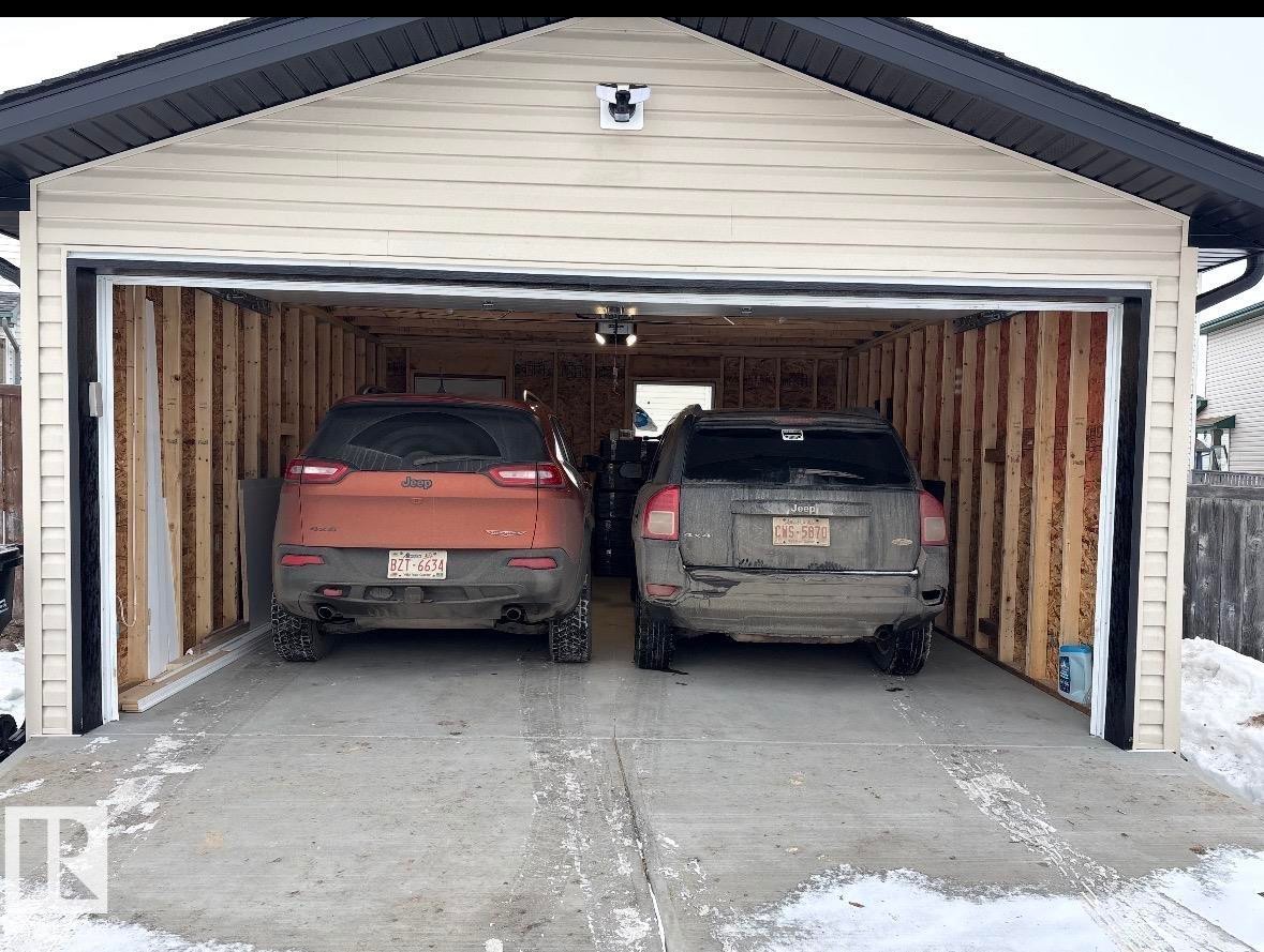 Garage with a garage door opener - 4503 149 Avenue, Edmonton, AB - Outdoor With Exterior