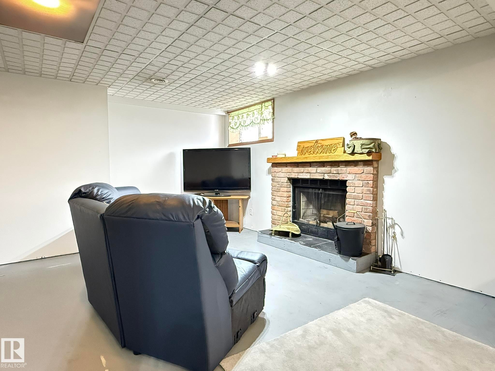 1 Bamber Place, Leduc, AB - Indoor With Fireplace