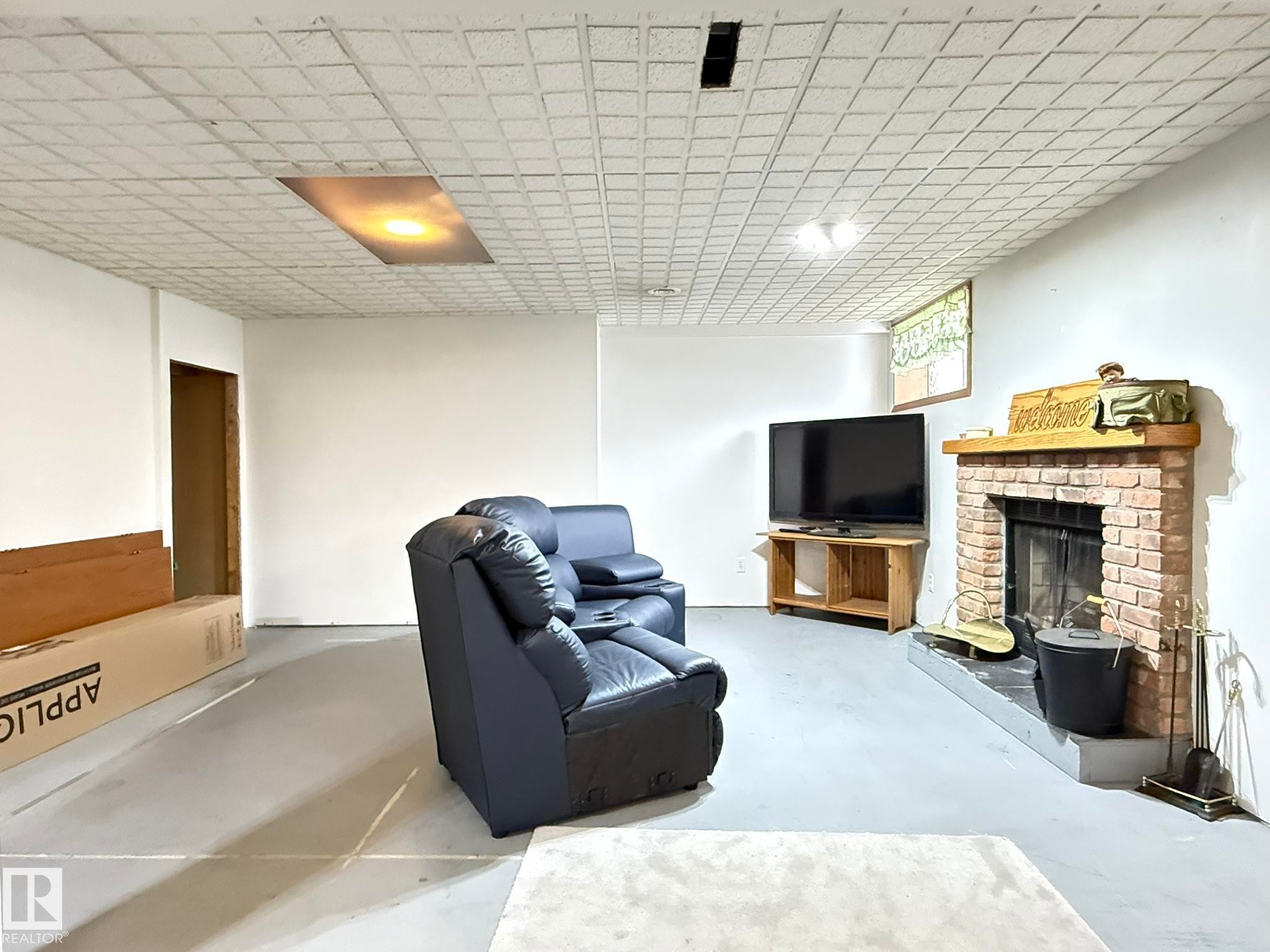 1 Bamber Place, Leduc, AB - Indoor With Fireplace