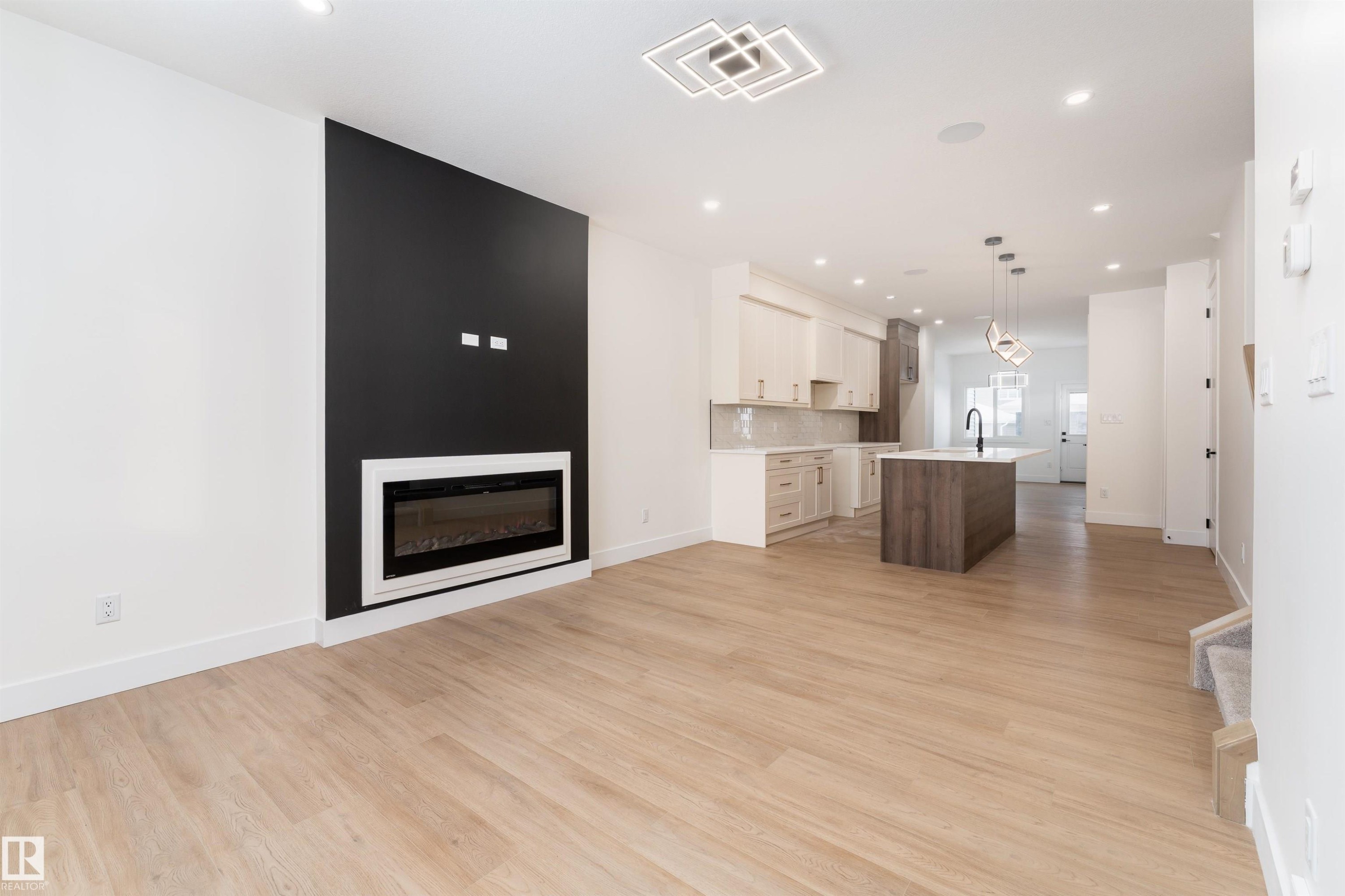 3103 Magpie Way, Edmonton, AB - Indoor Photo Showing Living Room With Fireplace