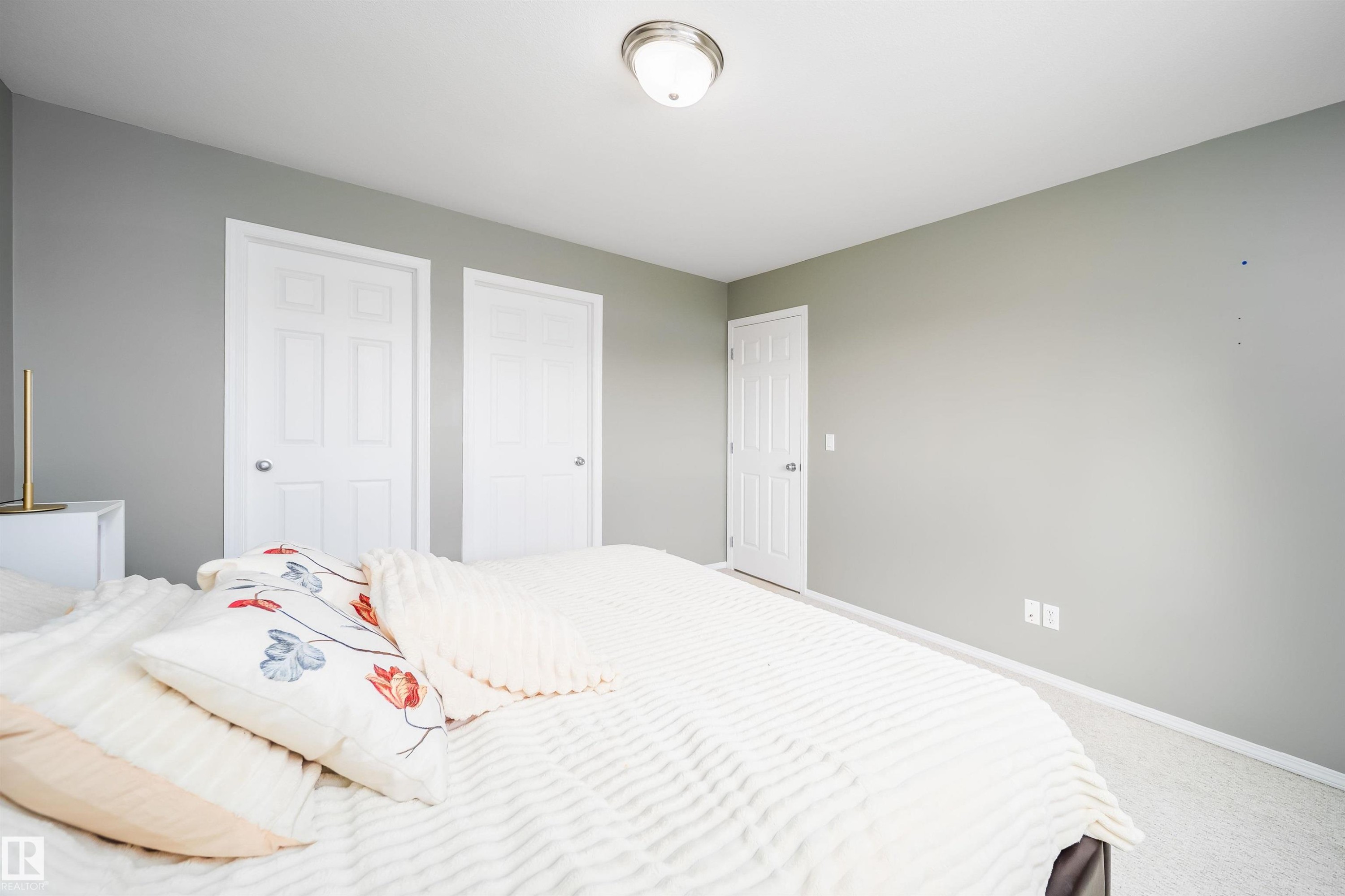 Bedroom with carpet and a closet - 1179 Oakland Drive, Devon, AB - Indoor Photo Showing Bedroom