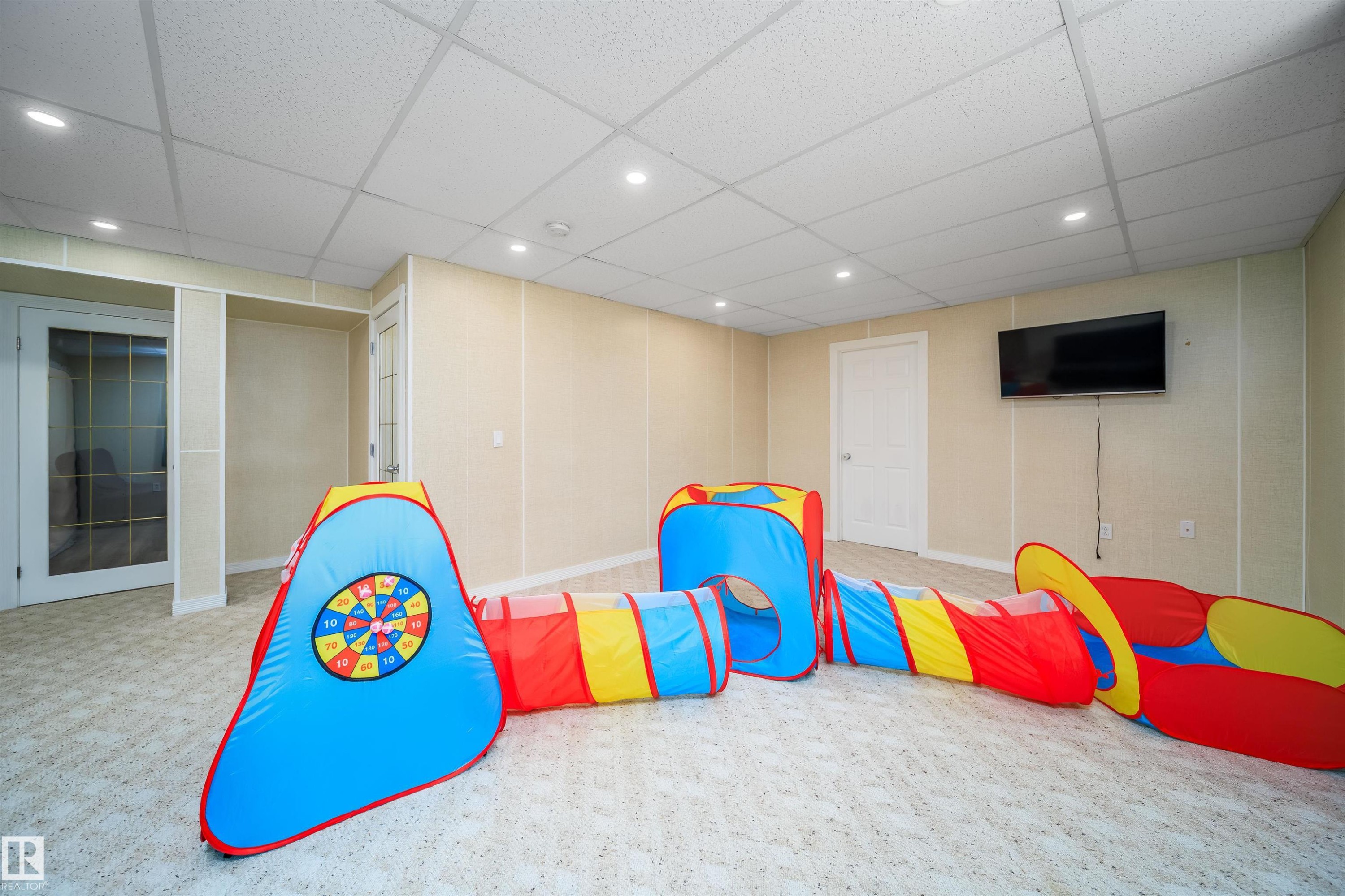 Game room with recessed lighting, a paneled ceiling, and carpet flooring - 1179 Oakland Drive, Devon, AB - Indoor