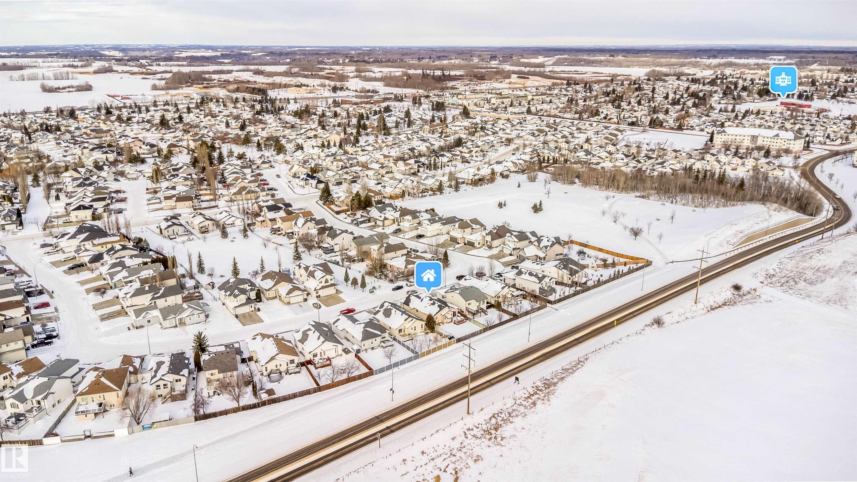 View of snowy aerial view - 1179 Oakland Drive, Devon, AB - Outdoor With View