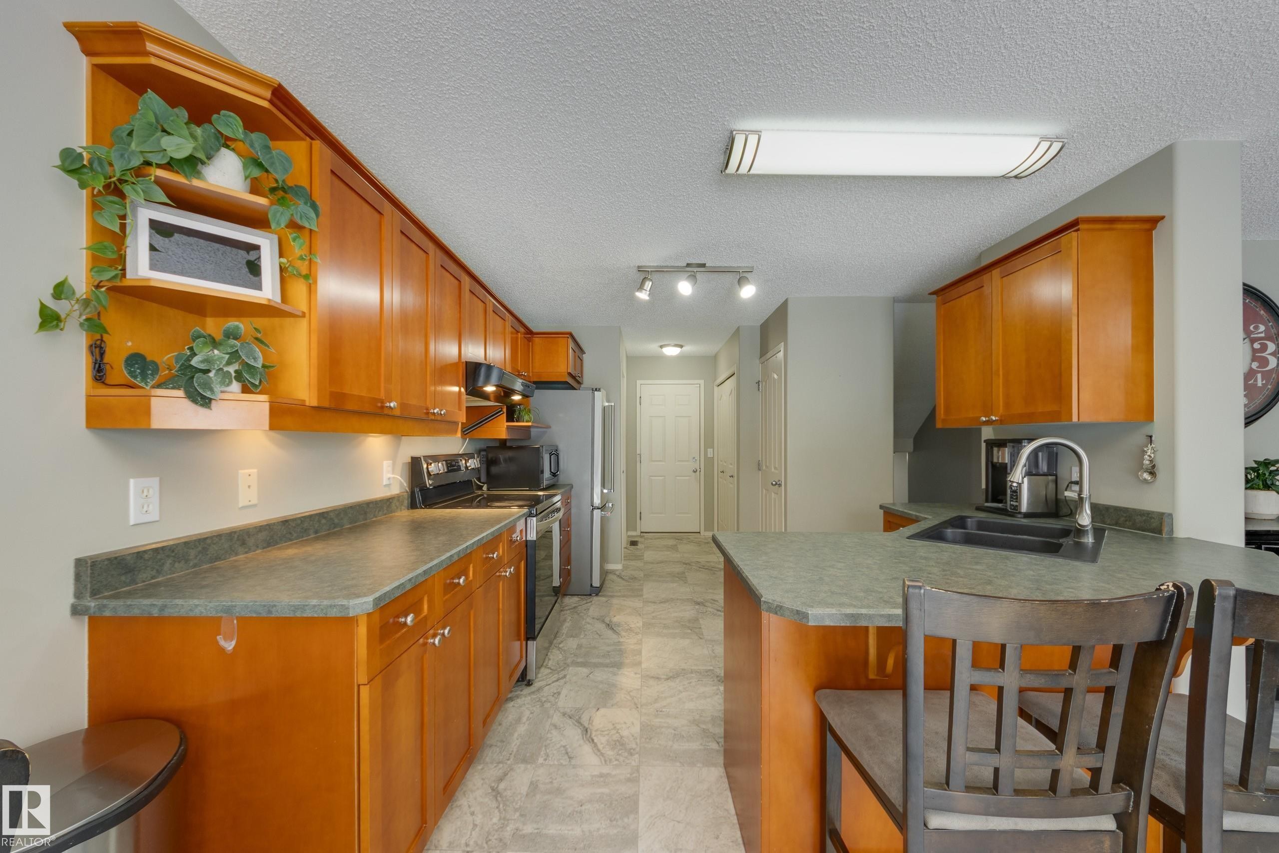 5 Greenbriar Place, Stony Plain, AB - Indoor Photo Showing Kitchen With Double Sink