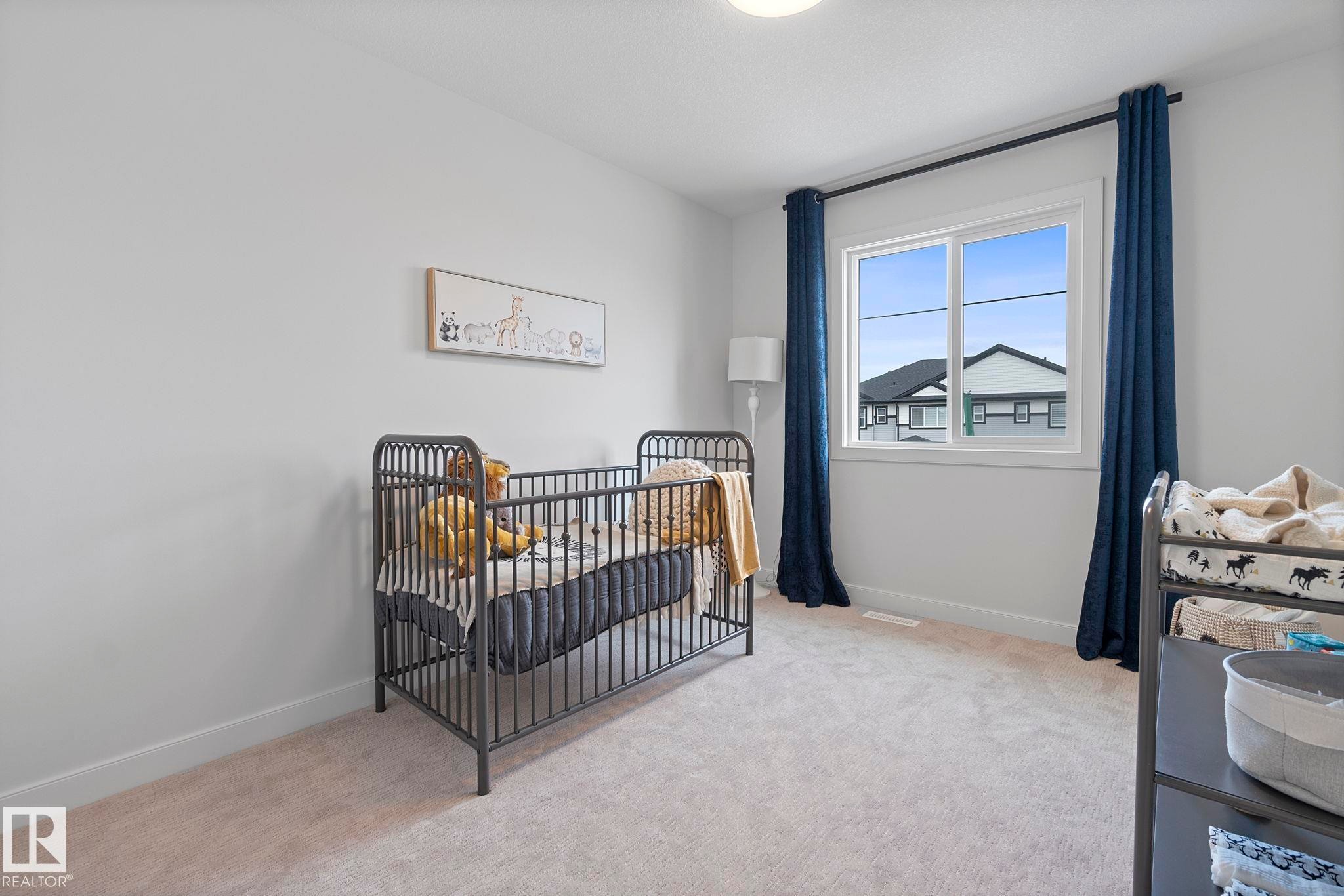 103 Dansereau Way, Beaumont, AB - Indoor Photo Showing Bedroom