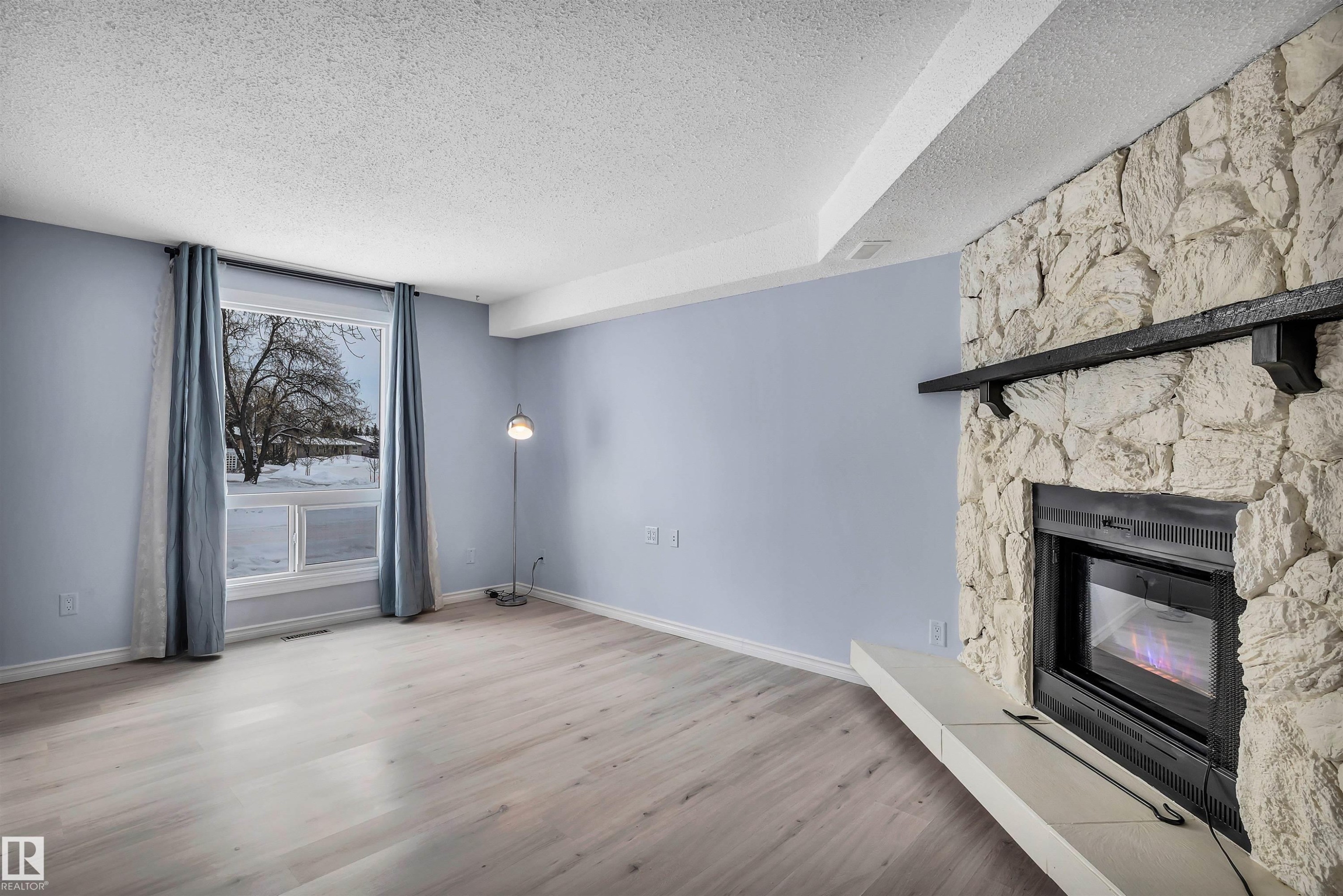 14204 31 Street, Edmonton, AB - Indoor Photo Showing Living Room With Fireplace
