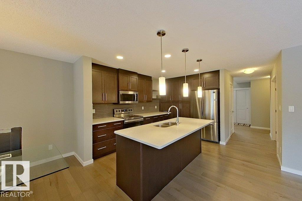 2342 Wonnacott Crescent, Edmonton, AB - Indoor Photo Showing Kitchen With Double Sink With Upgraded Kitchen