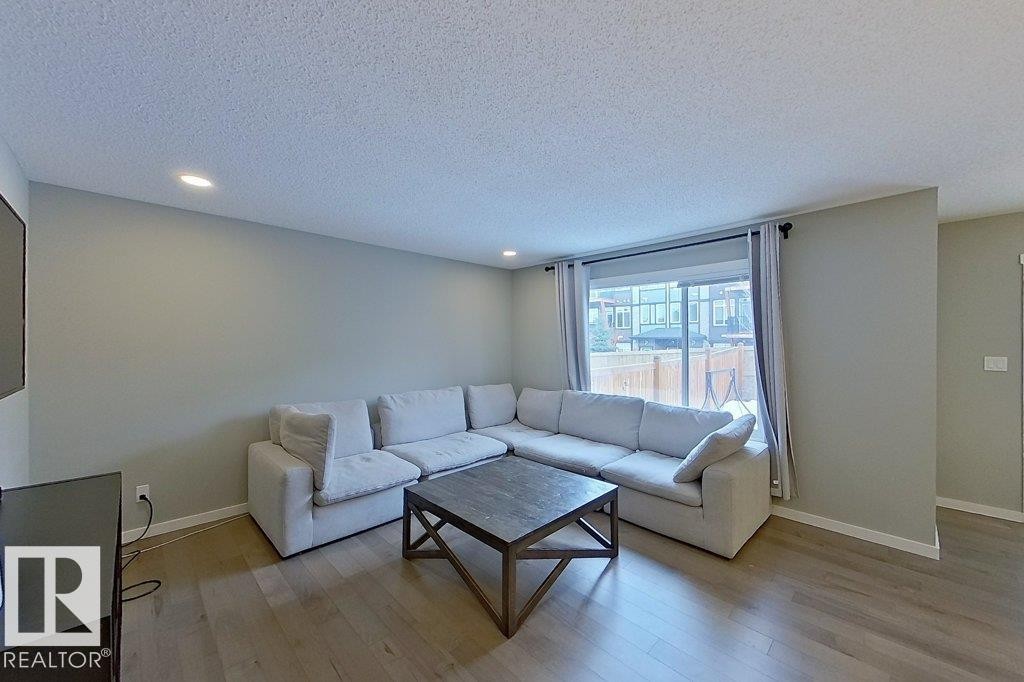 2342 Wonnacott Crescent, Edmonton, AB - Indoor Photo Showing Living Room