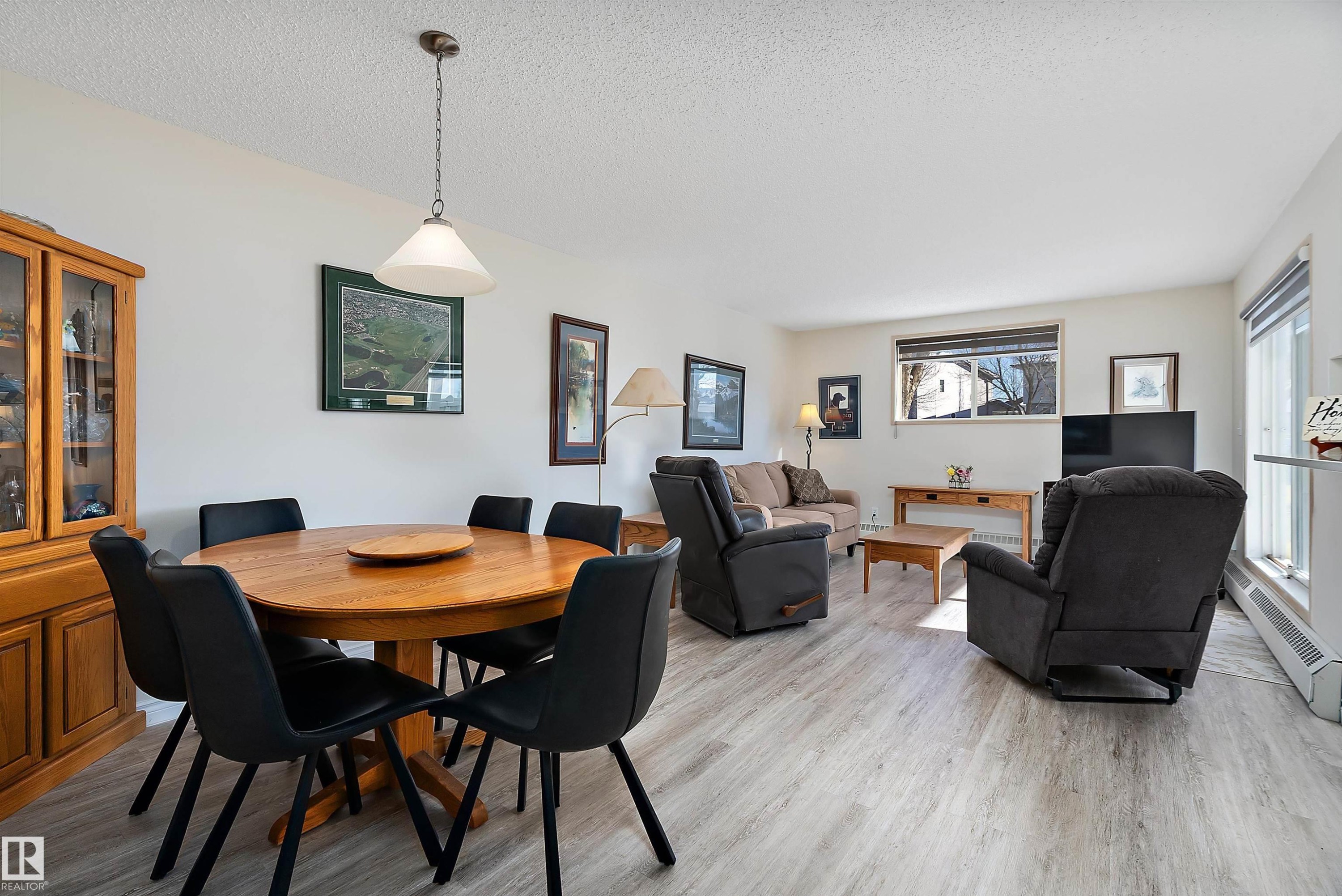 Dining space open to living room - 116 11620 9A Avenue, Edmonton, AB - Indoor Photo Showing Dining Room