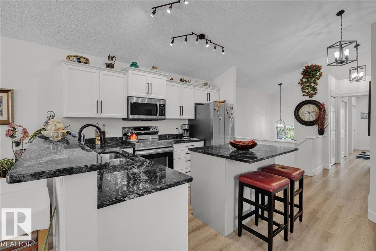 7608 15 Avenue, Edmonton, AB - Indoor Photo Showing Kitchen With Double Sink With Upgraded Kitchen