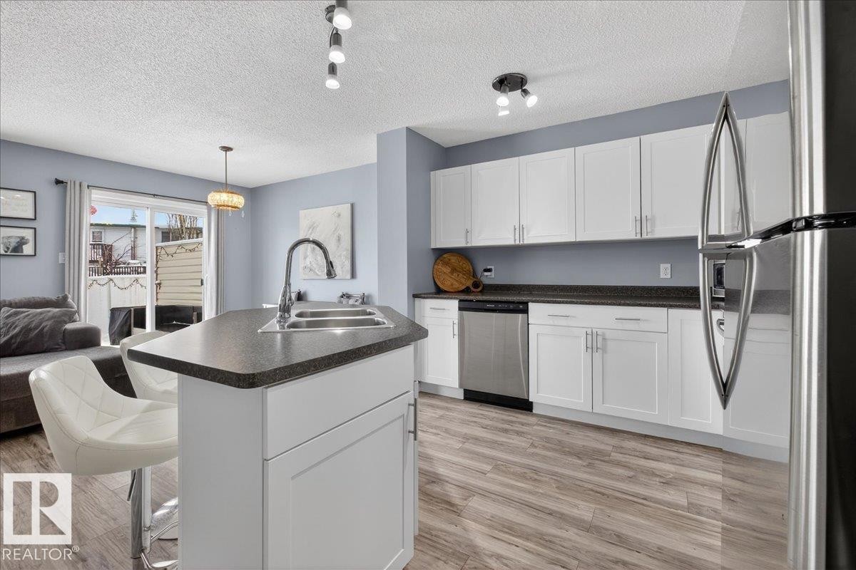 6828 159A Avenue, Edmonton, AB - Indoor Photo Showing Kitchen With Double Sink