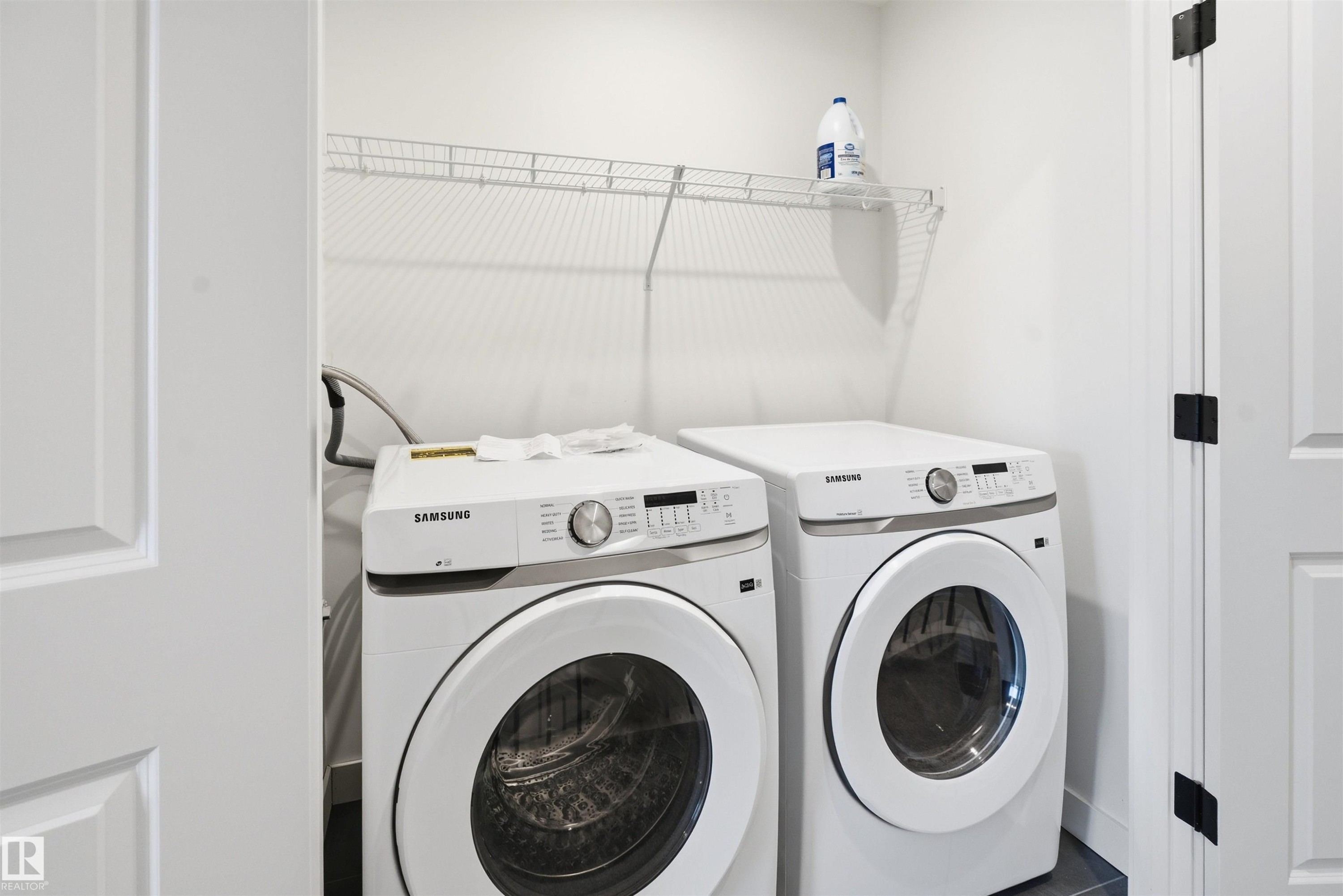 317 Juniper Cove, Leduc, AB - Indoor Photo Showing Laundry Room