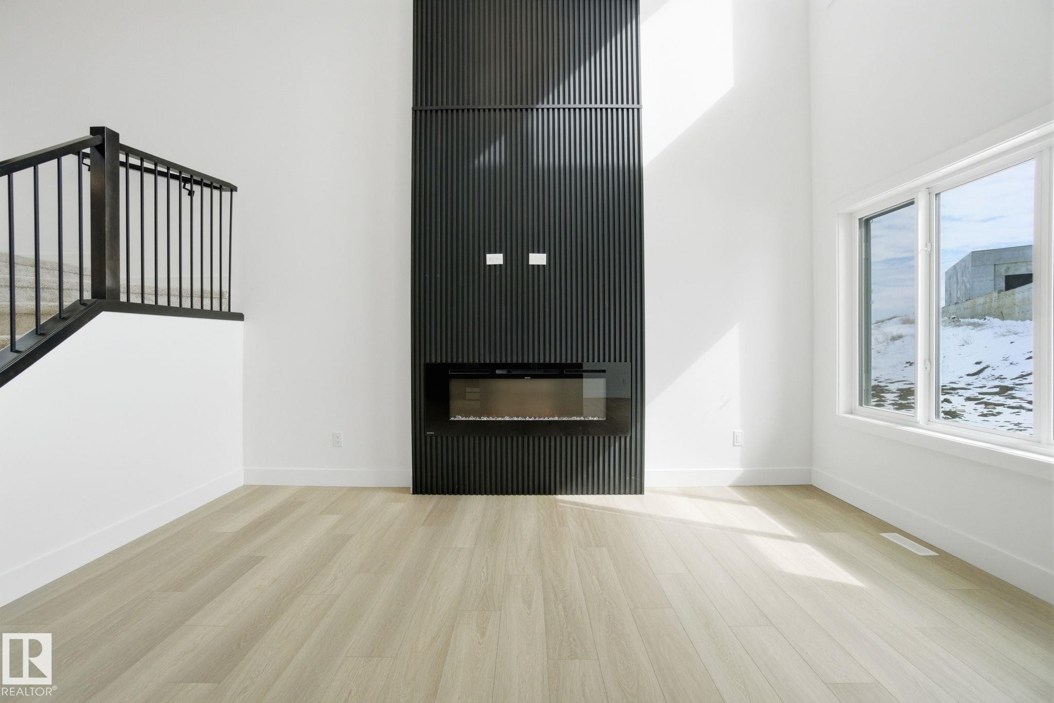 1405 Osprey Crest, Edmonton, AB - Indoor Photo Showing Other Room With Fireplace