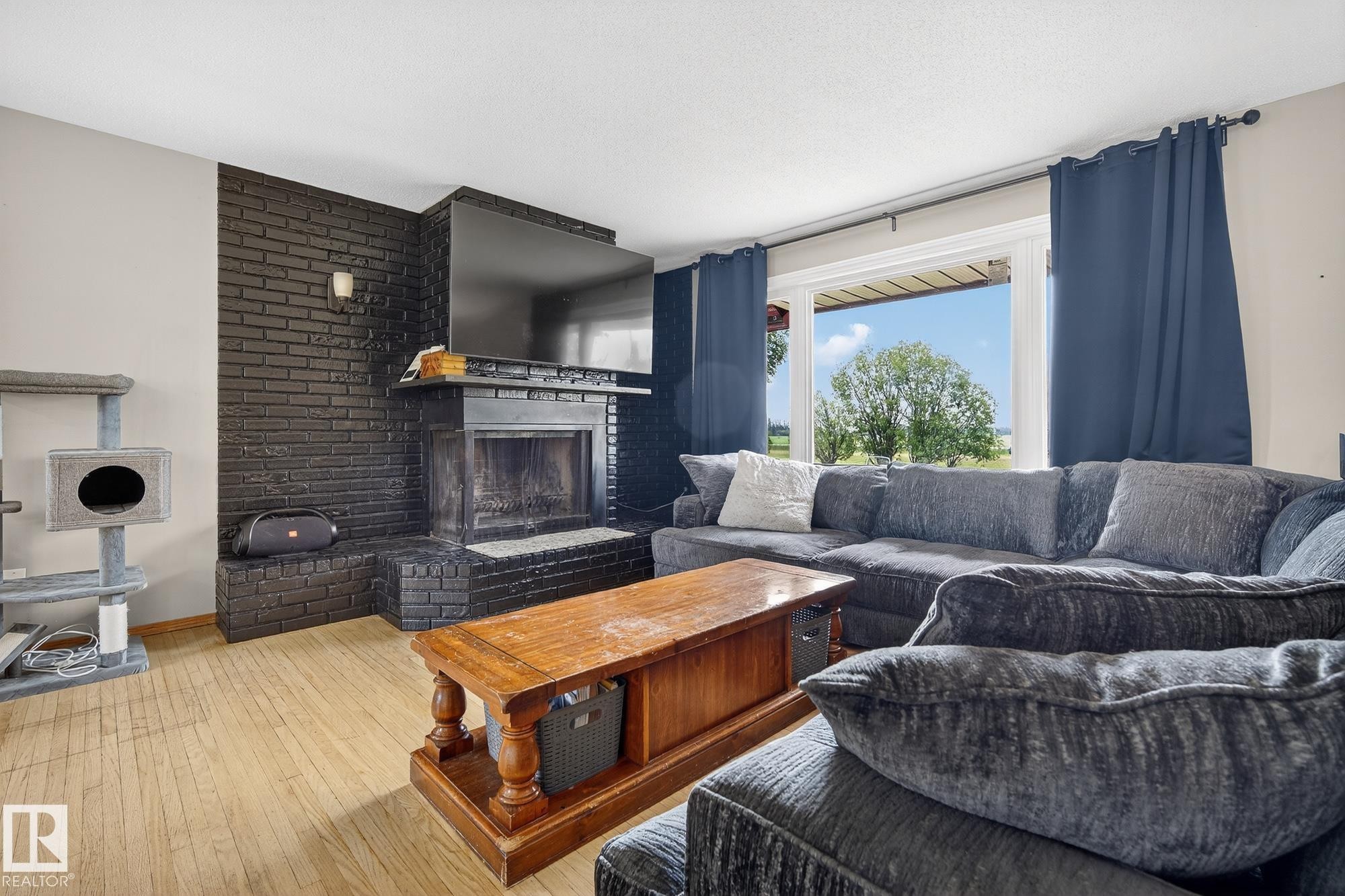 320 1 Avenue, Thorhild, AB - Indoor Photo Showing Living Room With Fireplace