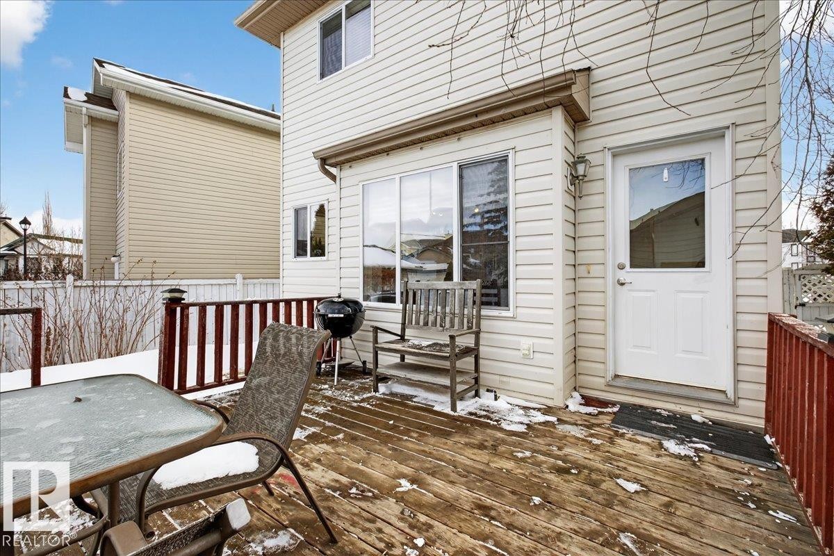 Snow covered deck featuring outdoor dining space and grilling area - 4519 Turner Square, Edmonton, AB - Outdoor With Deck Patio Veranda With Exterior