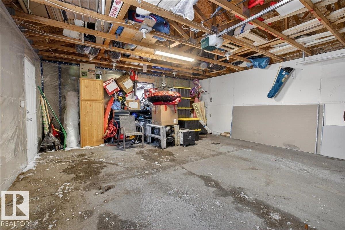 Garage featuring a garage door opener - 4519 Turner Square, Edmonton, AB - Indoor Photo Showing Basement