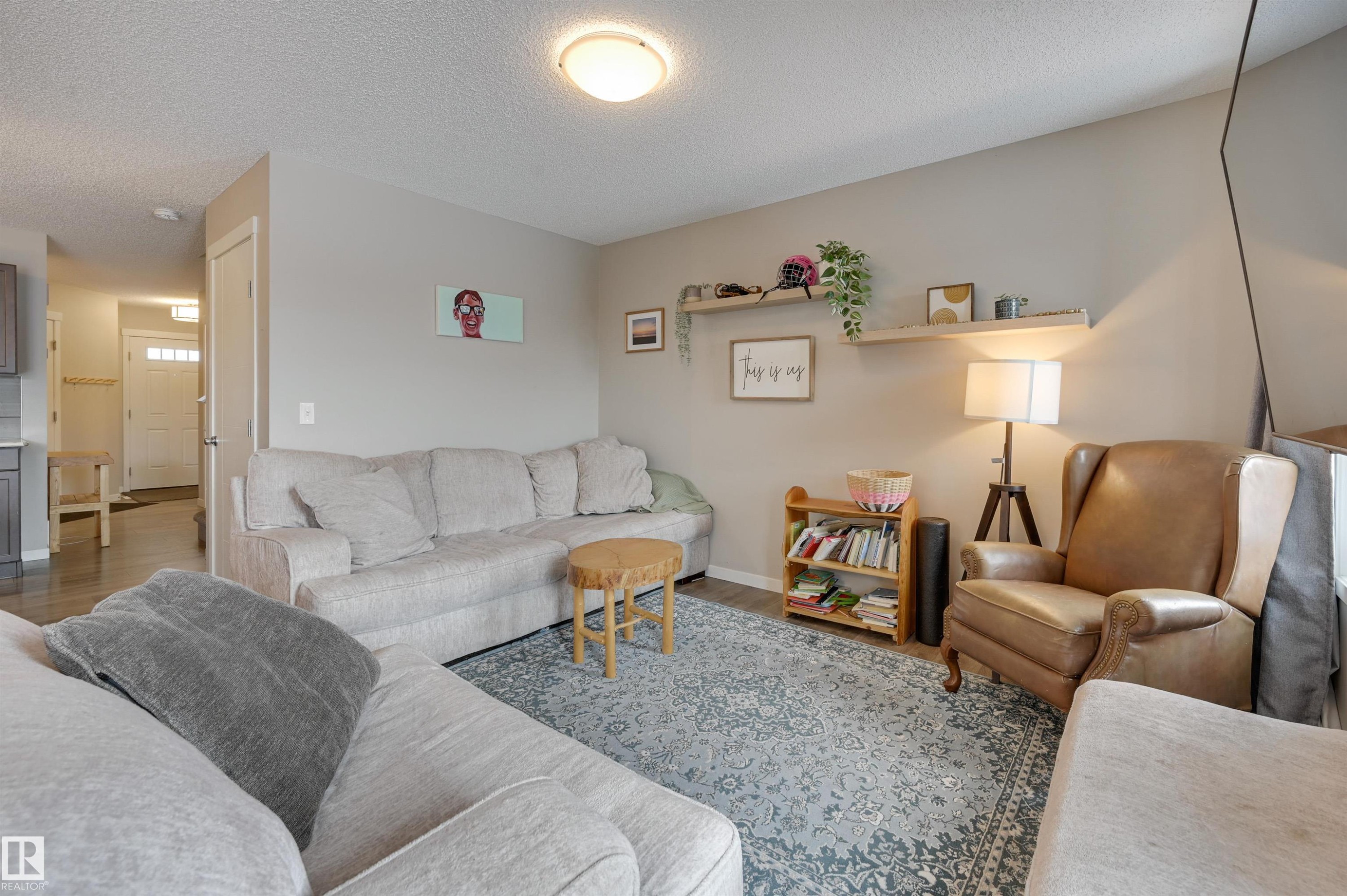 921 Ebbers Crescent, Edmonton, AB - Indoor Photo Showing Living Room With Fireplace