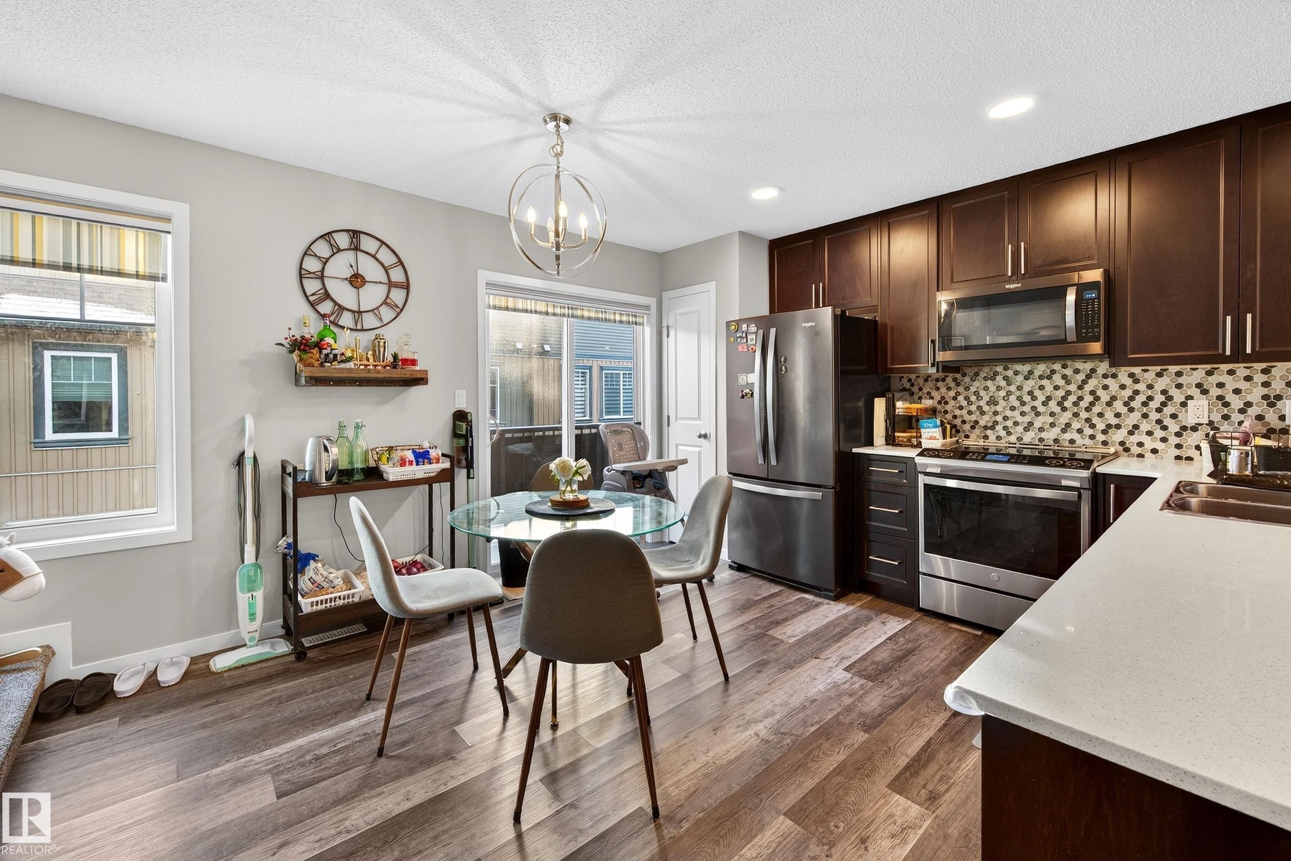 103 3305 Orchards Link, Edmonton, AB - Indoor Photo Showing Kitchen With Stainless Steel Kitchen With Double Sink