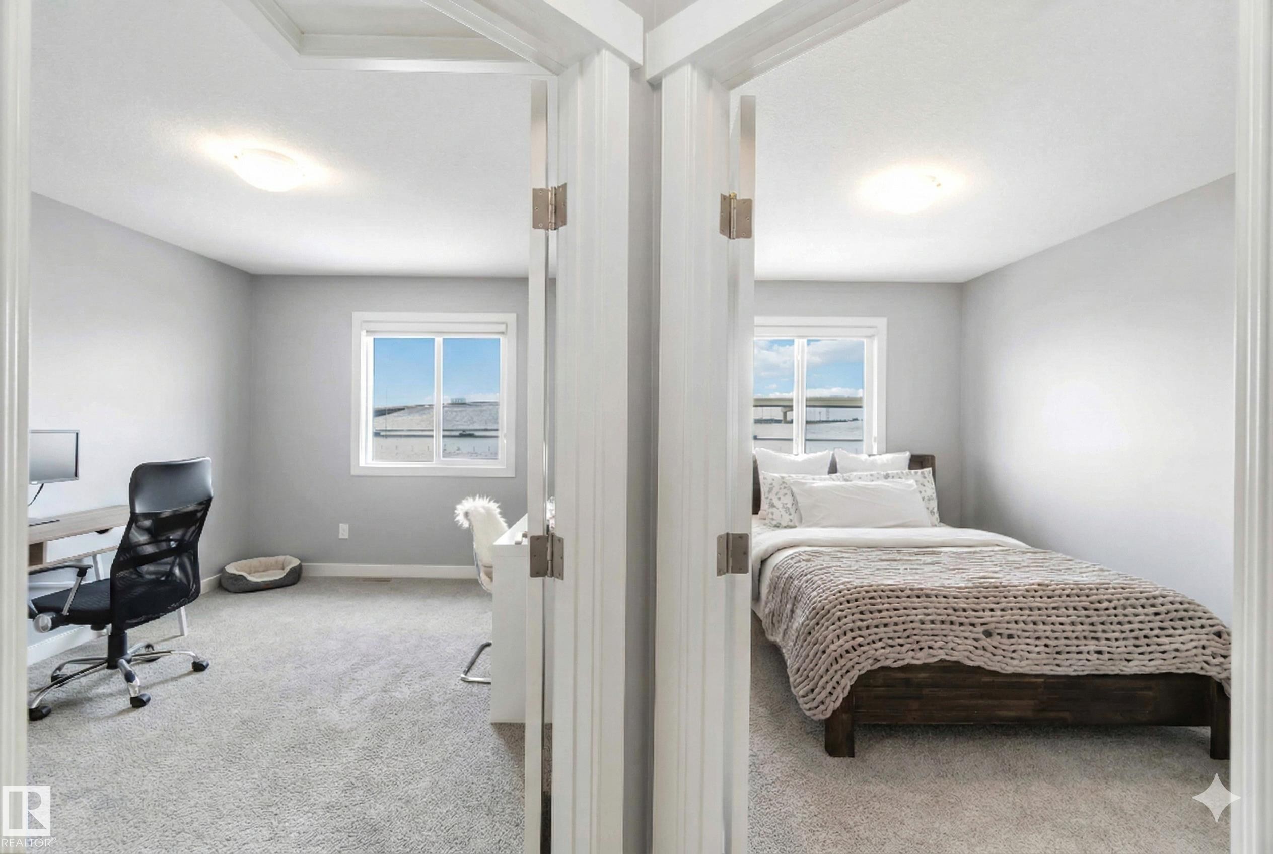 Bedroom with light carpet and a desk - 17143 38 Street, Edmonton, AB - Indoor Photo Showing Bedroom