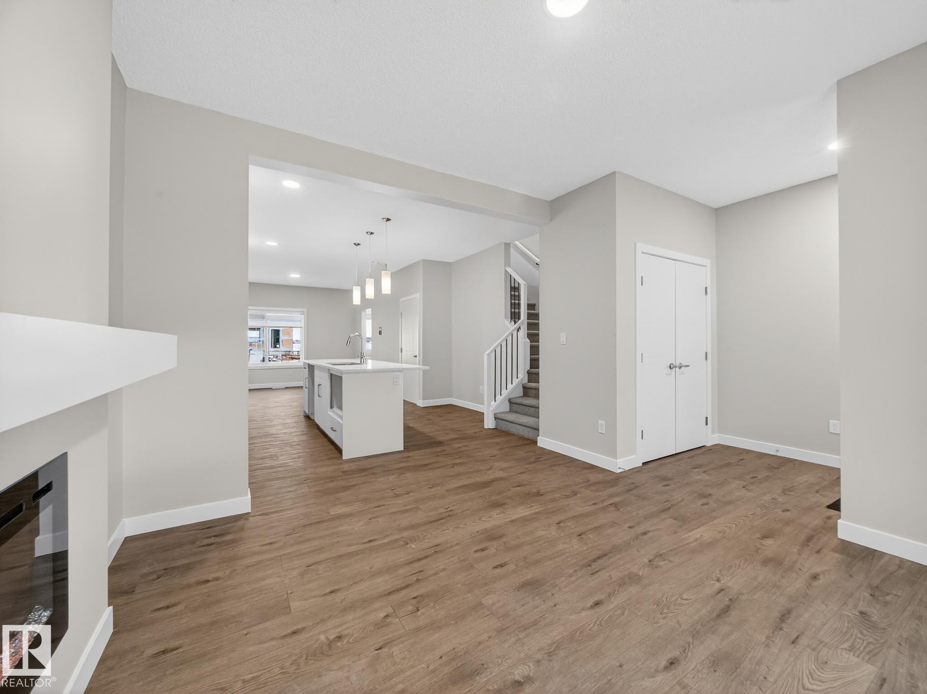 301 Brae Way, Leduc, AB - Indoor Photo Showing Other Room With Fireplace
