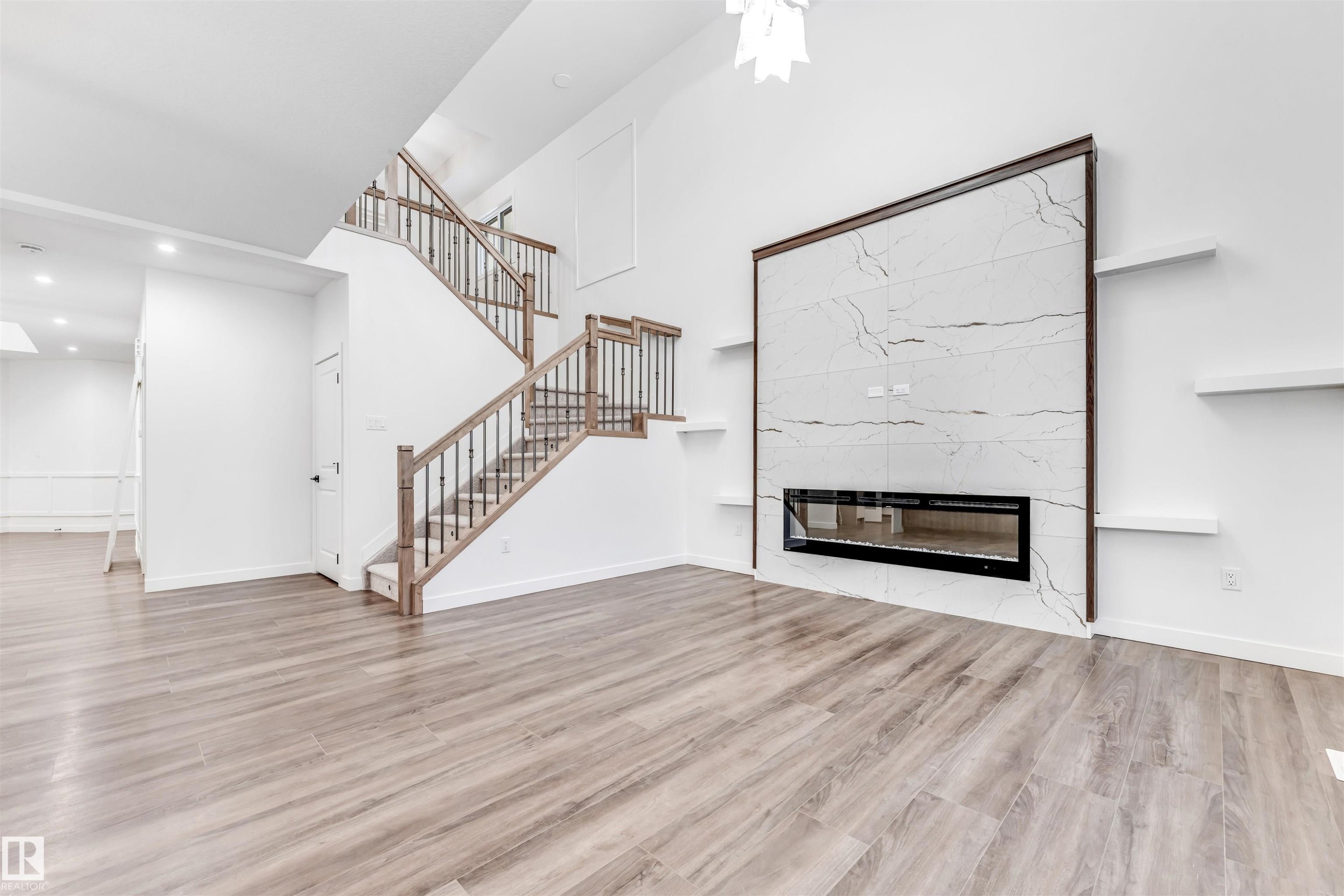 136 Creekside Lane, Leduc, AB - Indoor With Fireplace