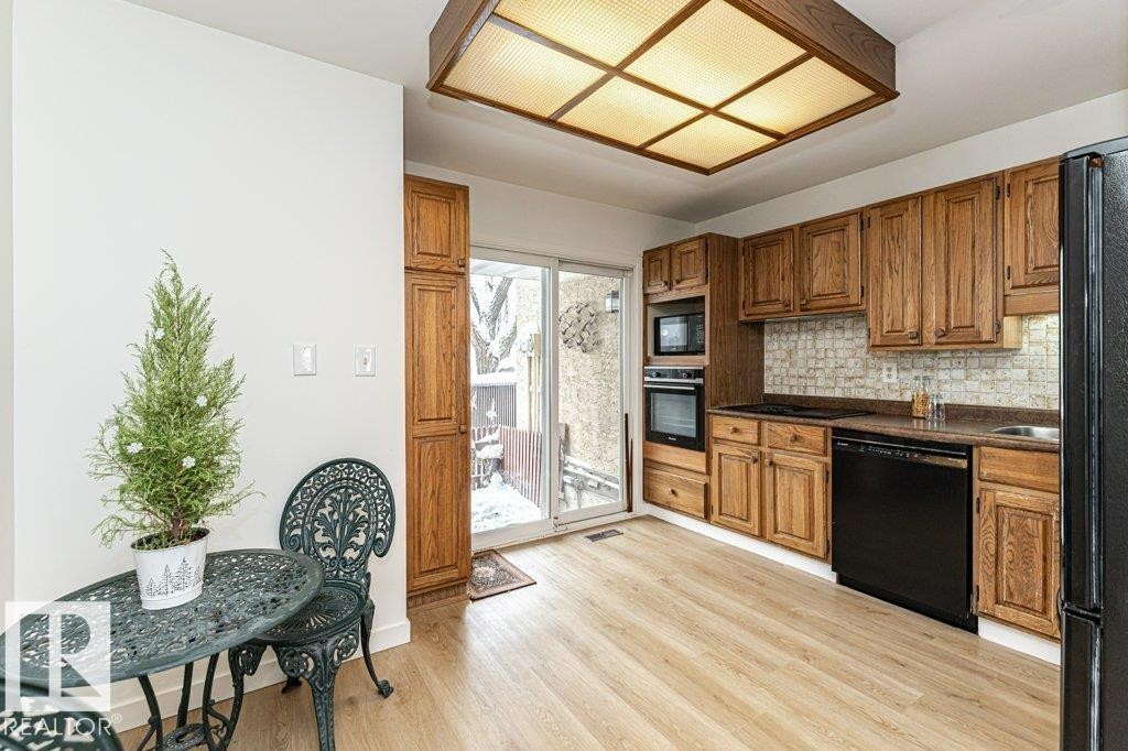 14916 43 Avenue, Edmonton, AB - Indoor Photo Showing Living Room With Fireplace