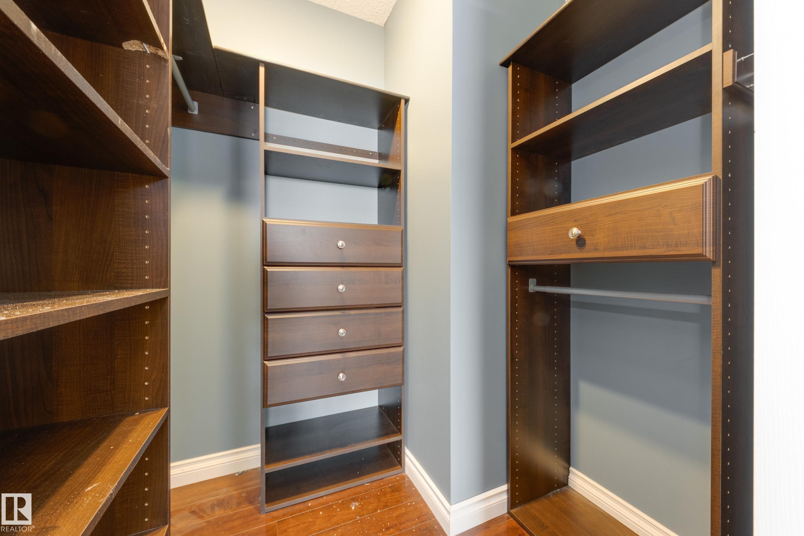Walk in closet with light wood-style flooring - 9916 178 Avenue, Edmonton, AB - Indoor Photo Showing Other Room