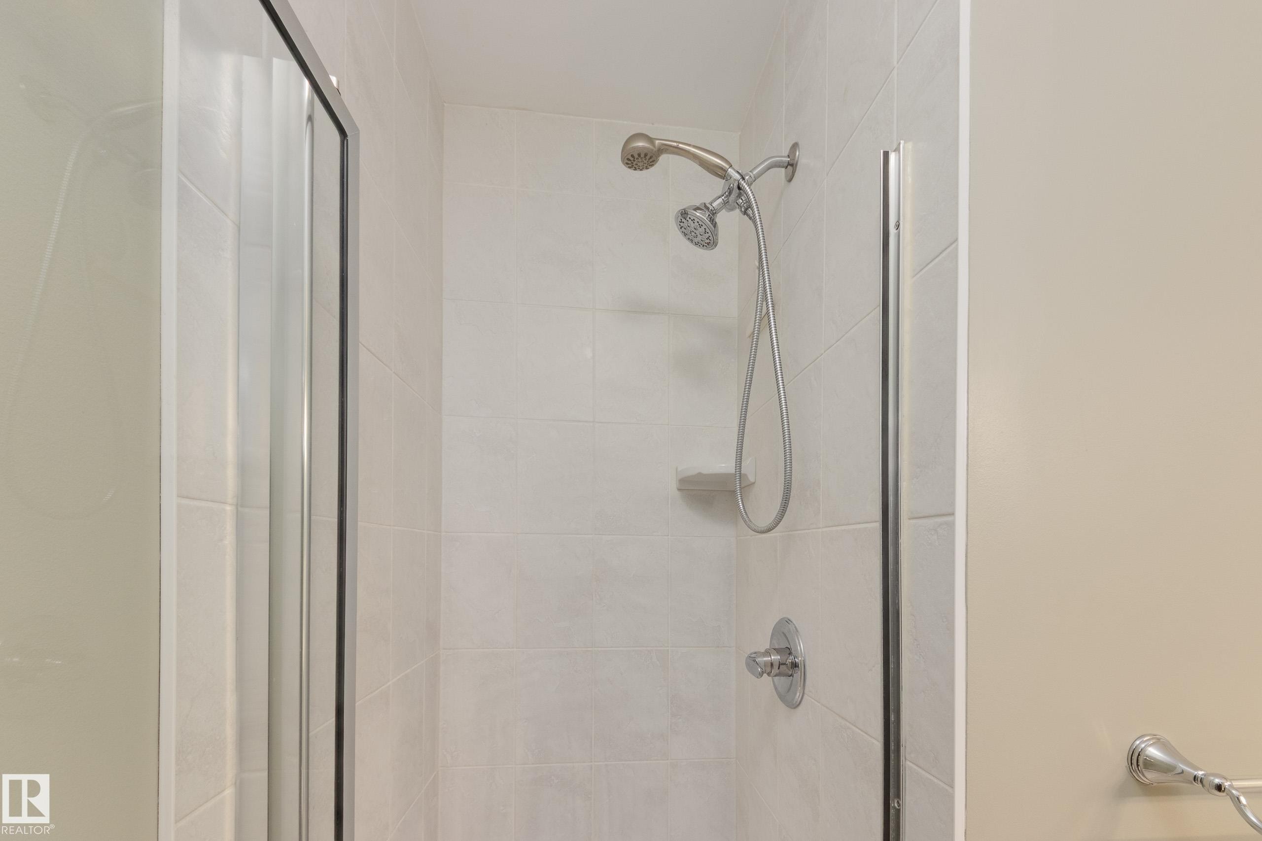 Full bathroom with a shower stall - 9916 178 Avenue, Edmonton, AB - Indoor Photo Showing Bathroom