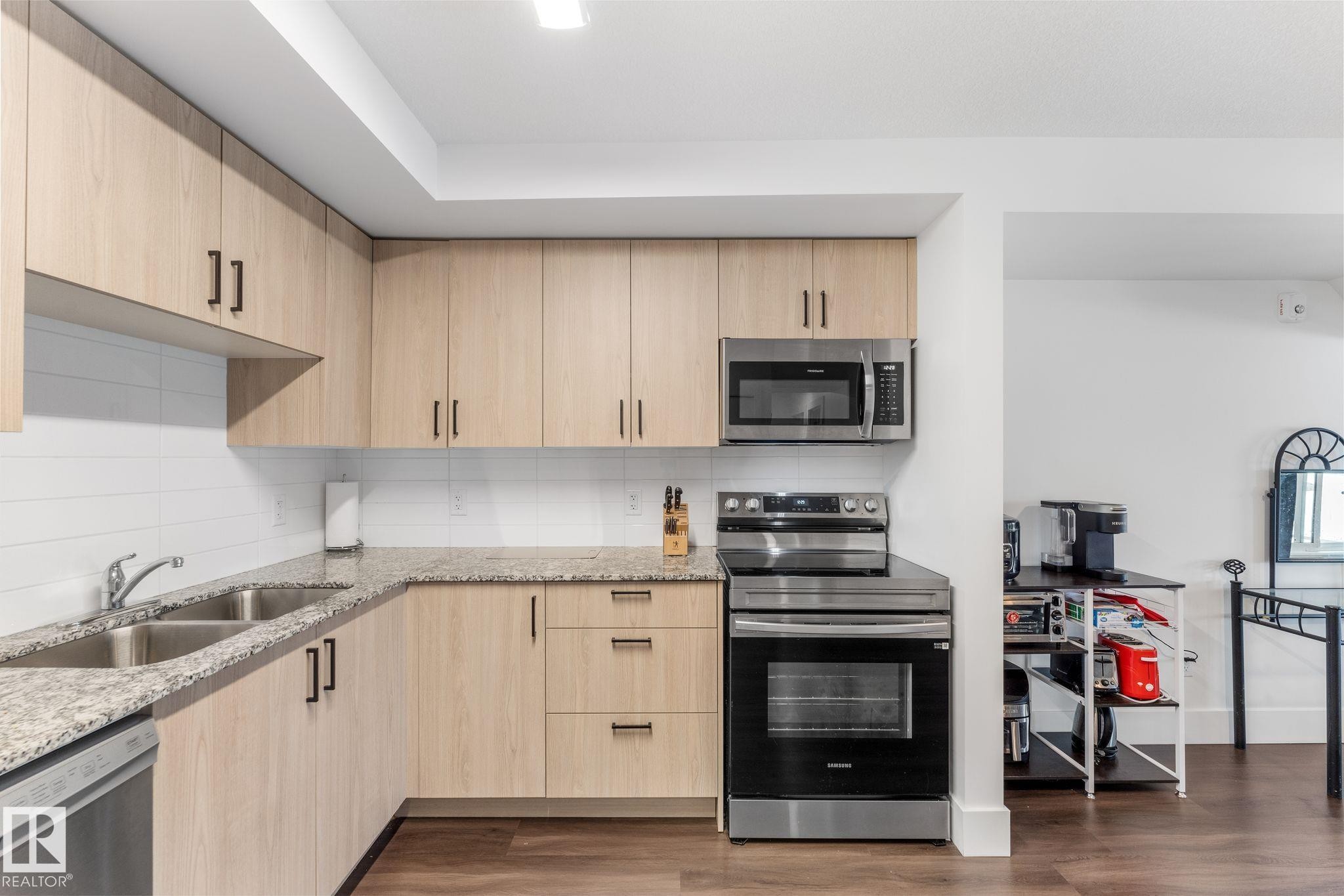 302 9504 182 Street, Edmonton, AB - Indoor Photo Showing Kitchen With Double Sink