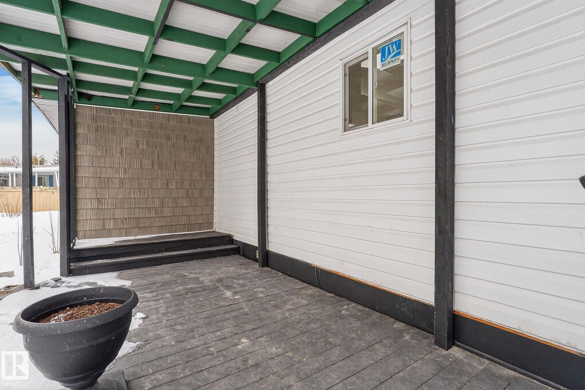 View of patio featuring a wooden deck - 72 Evergreen Park, Edmonton, AB - Outdoor With Exterior