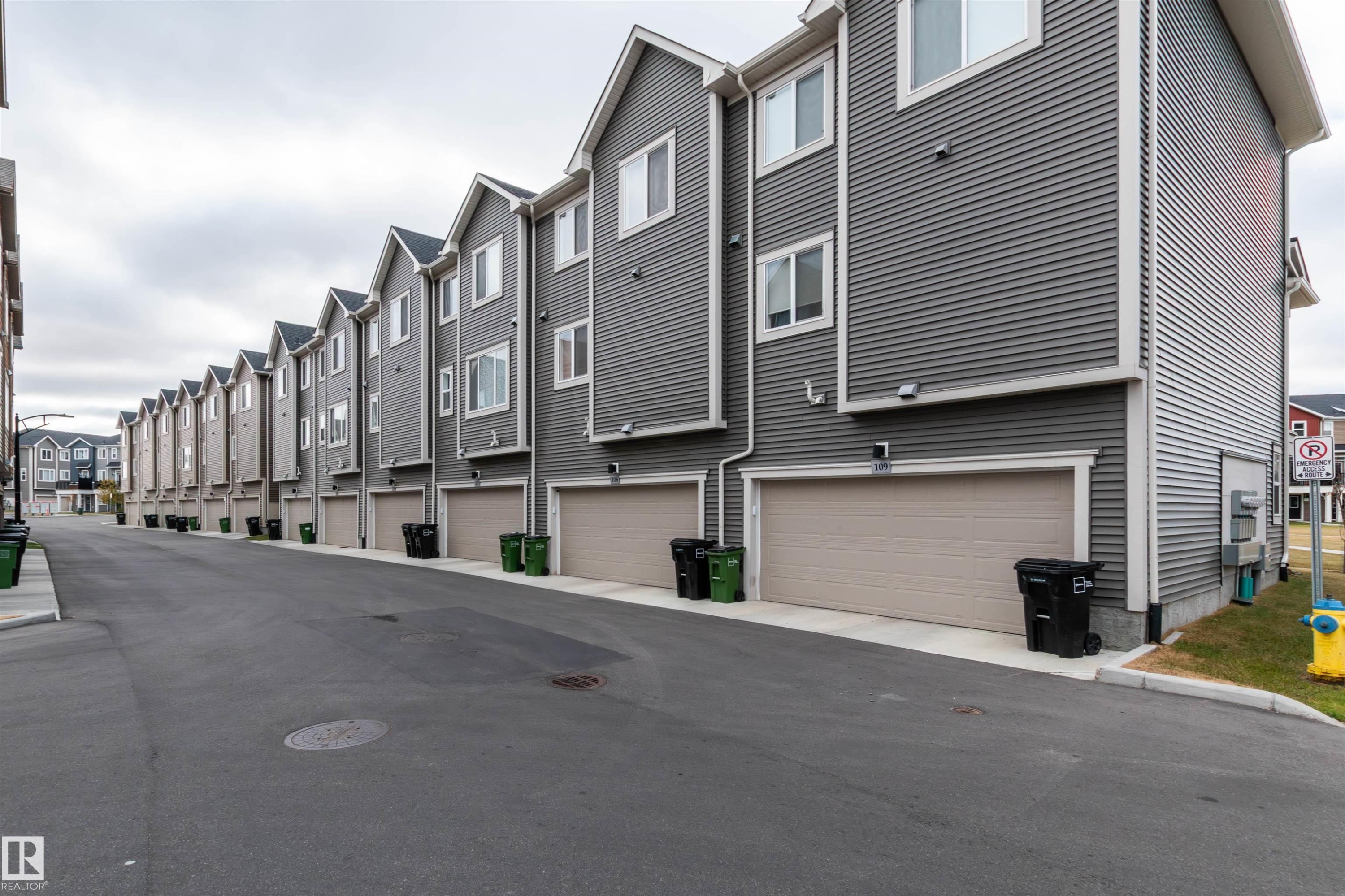 View of road featuring a residential view - 105 2072 Wonnacott Way, Edmonton, AB - Outdoor
