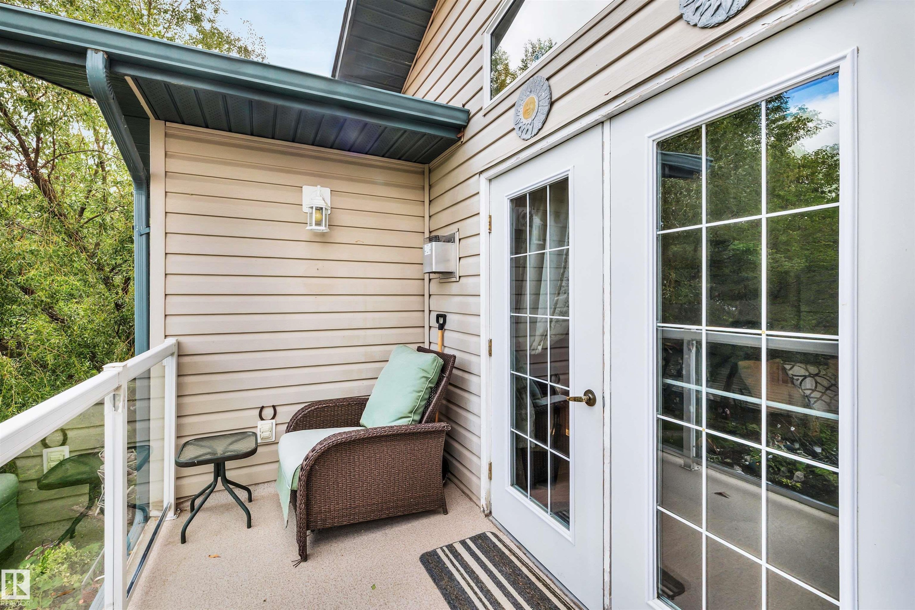 Balcony with french doors - 605 6St. Ross Haven, Rural Lac Ste. Anne County, AB - Outdoor With Exterior