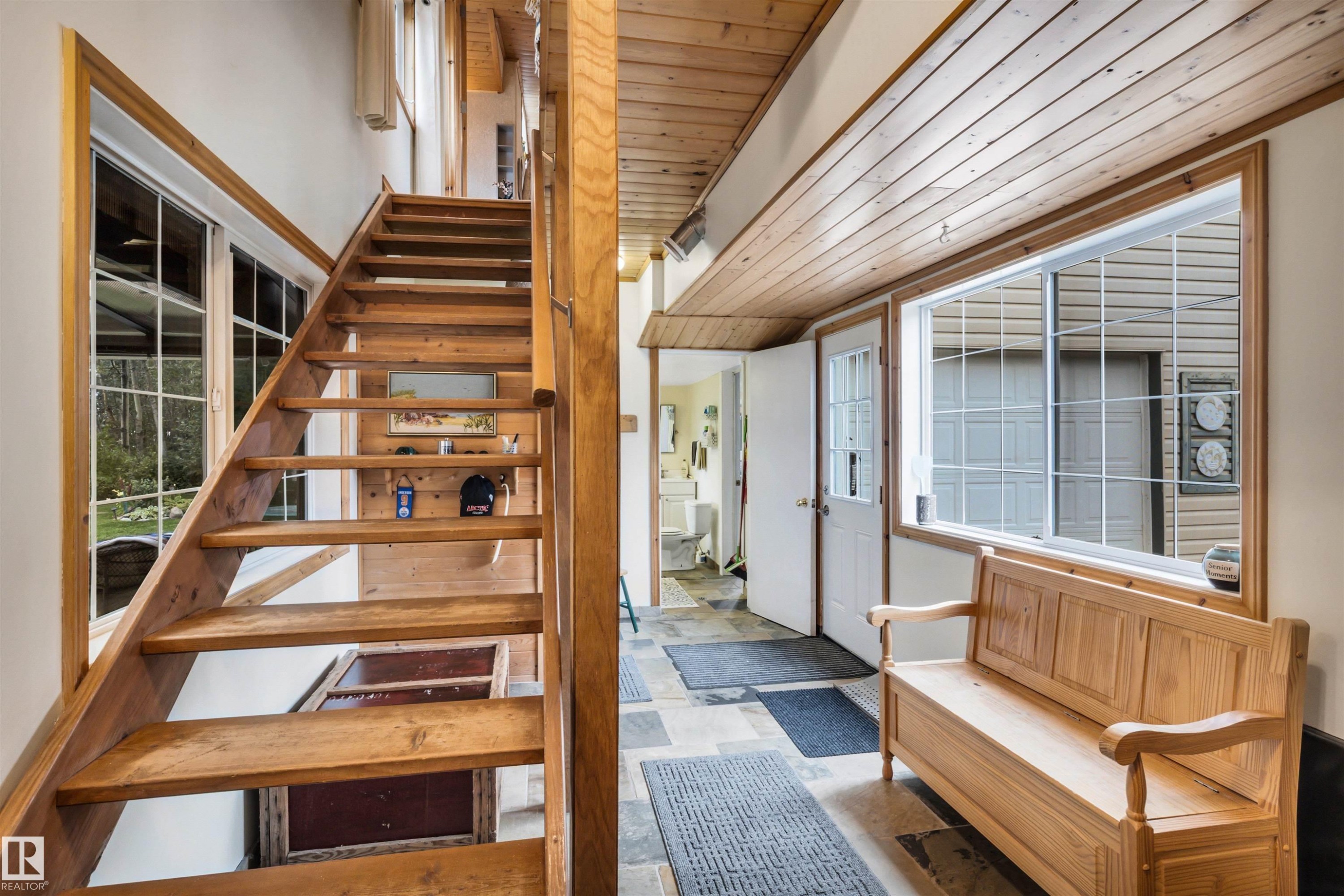 Stairs with wooden ceiling and tile patterned floors - 605 6St. Ross Haven, Rural Lac Ste. Anne County, AB - Photo Showing Other Room