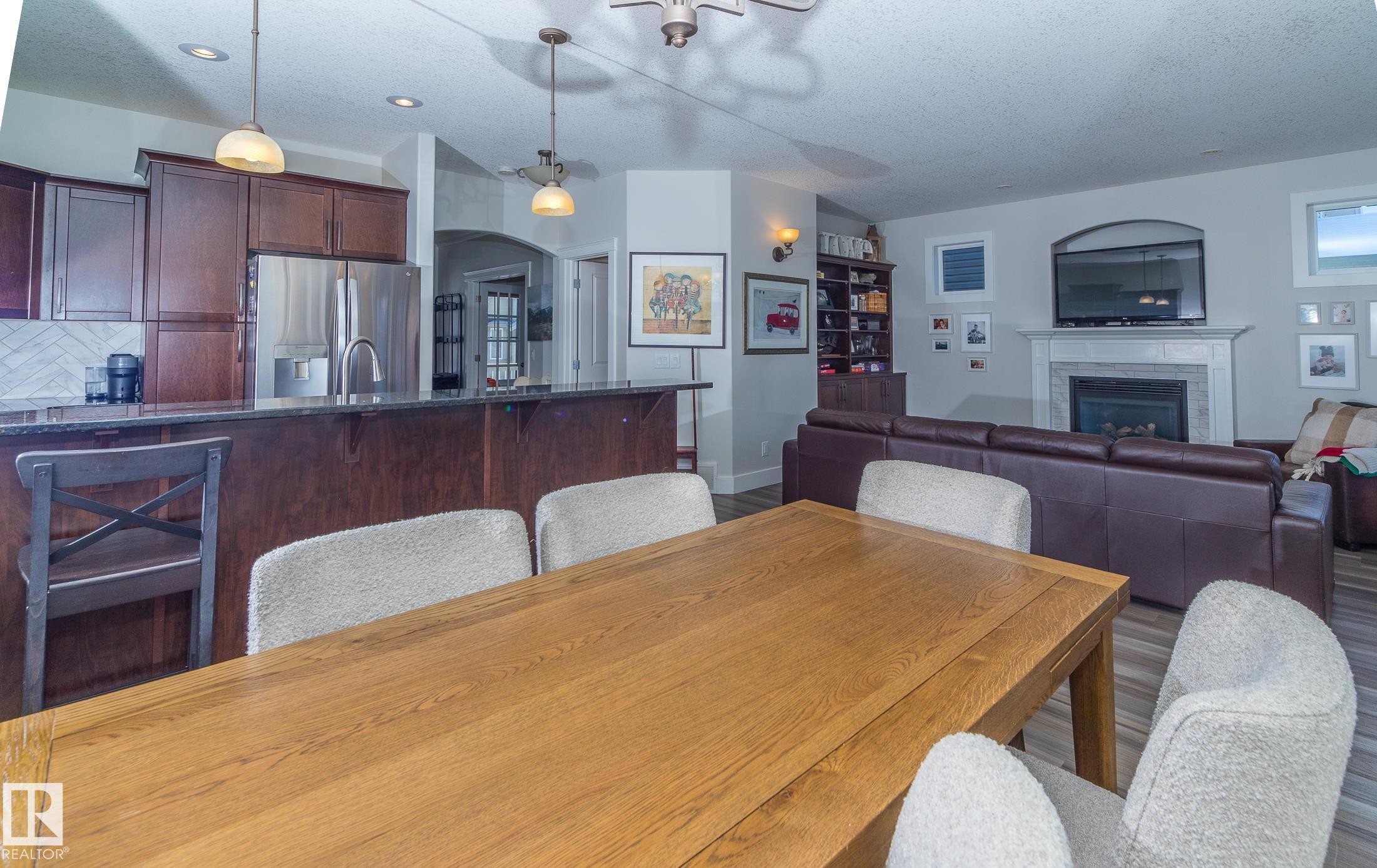 6152 Stinson Way, Edmonton, AB - Indoor Photo Showing Other Room With Fireplace
