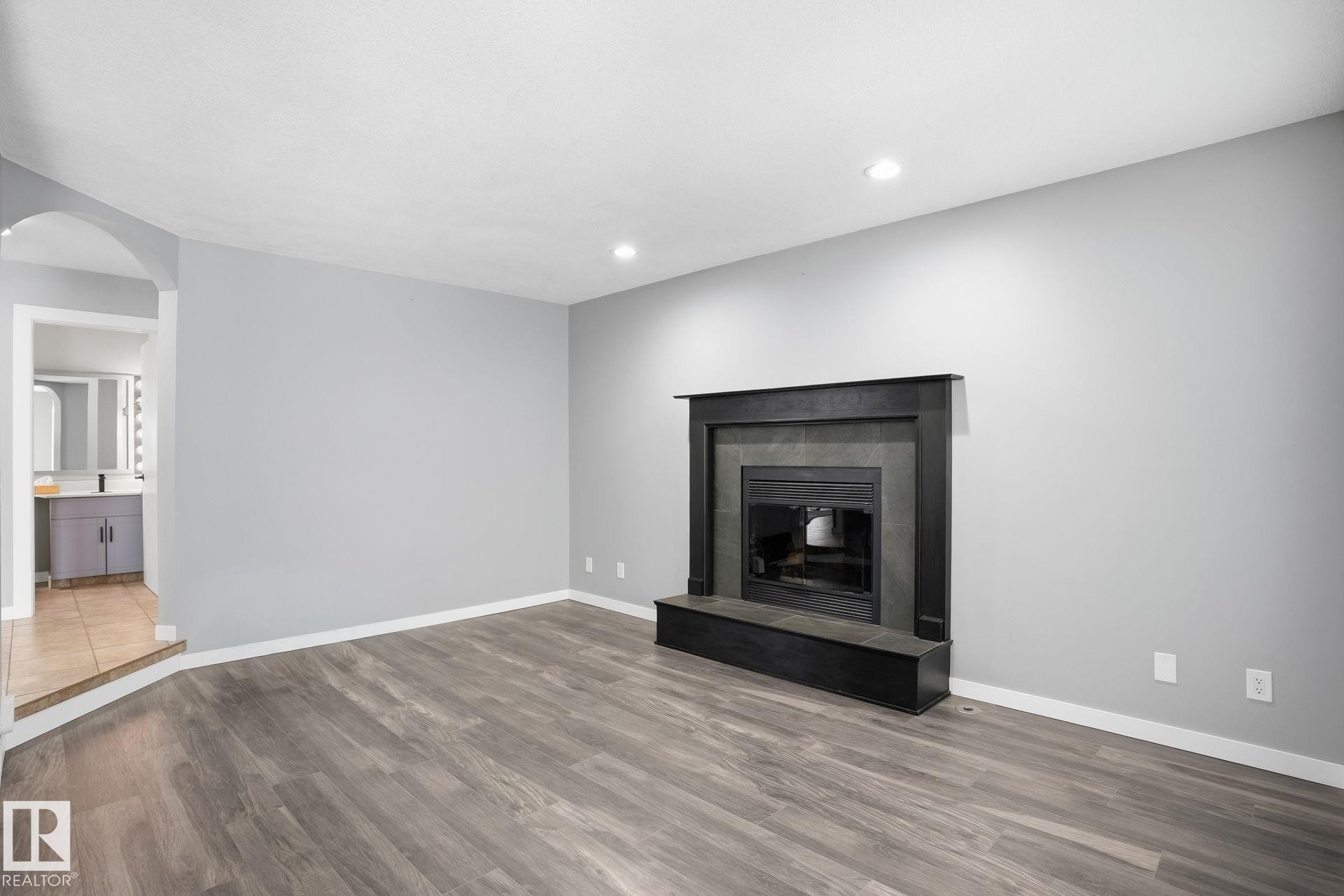 11019 10 Avenue, Edmonton, AB - Indoor Photo Showing Living Room With Fireplace