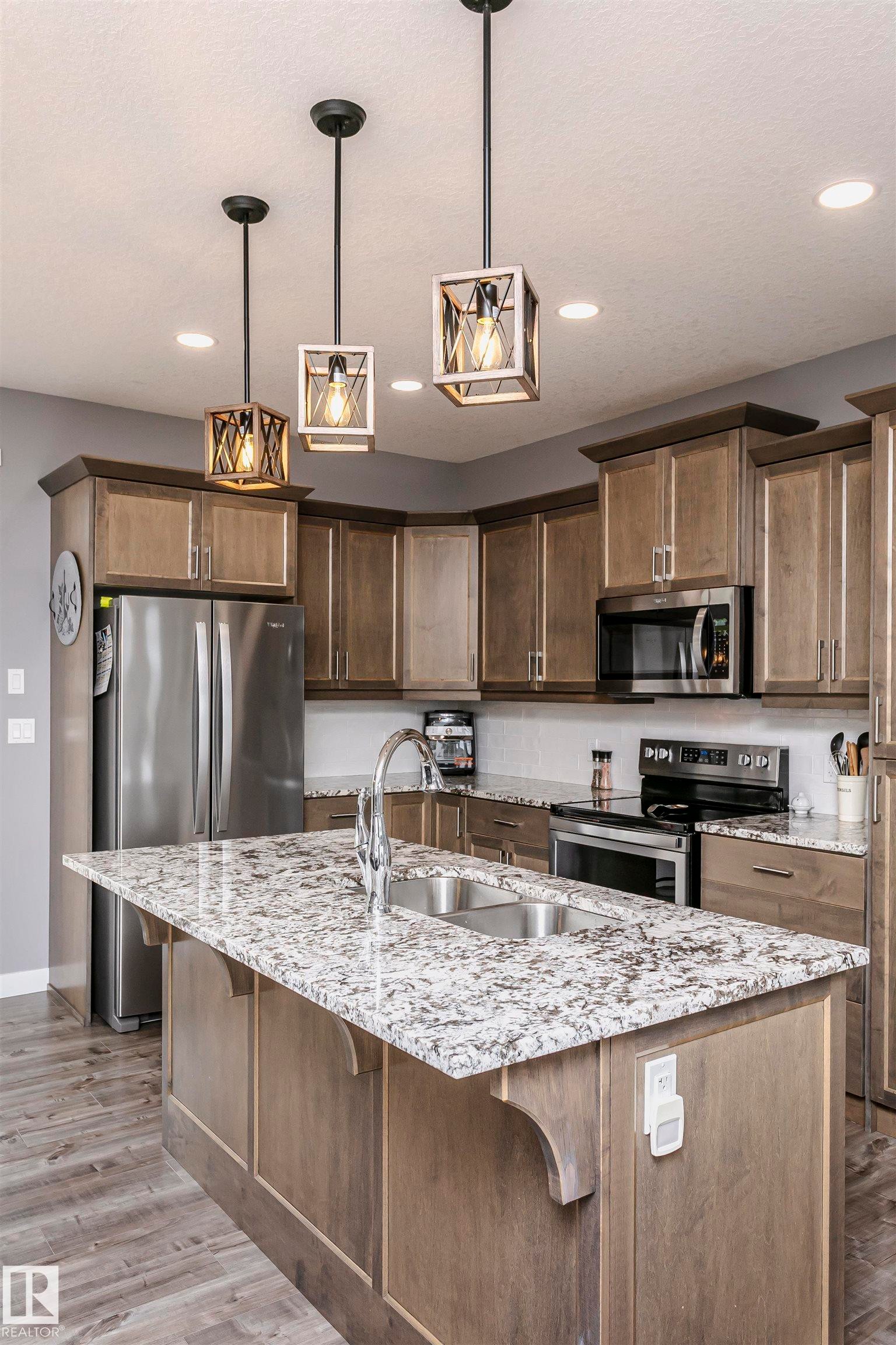 611 55101 Ste Anne Trail, Rural Lac Ste. Anne County, AB - Indoor Photo Showing Kitchen With Double Sink With Upgraded Kitchen