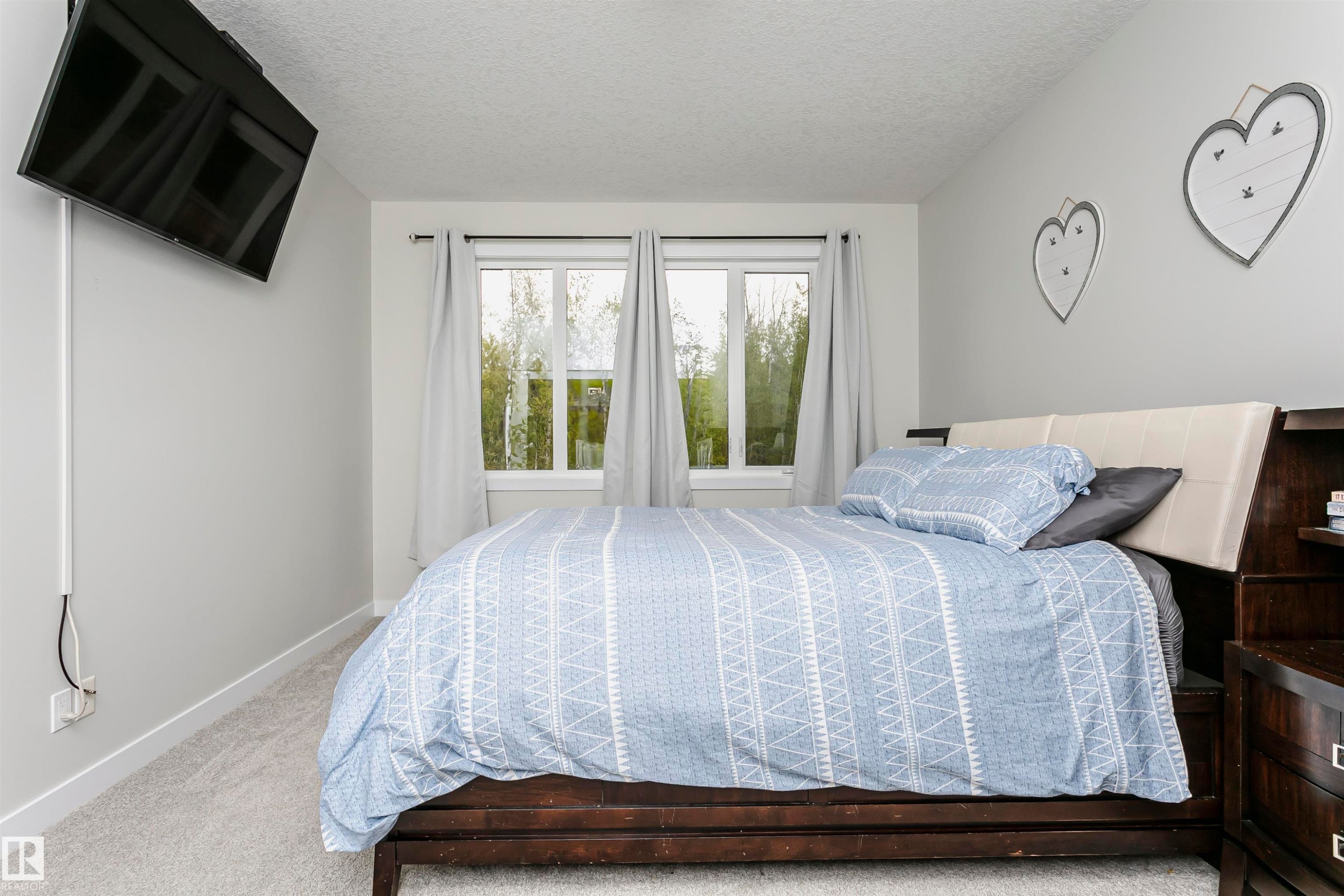611 55101 Ste Anne Trail, Rural Lac Ste. Anne County, AB - Indoor Photo Showing Bedroom